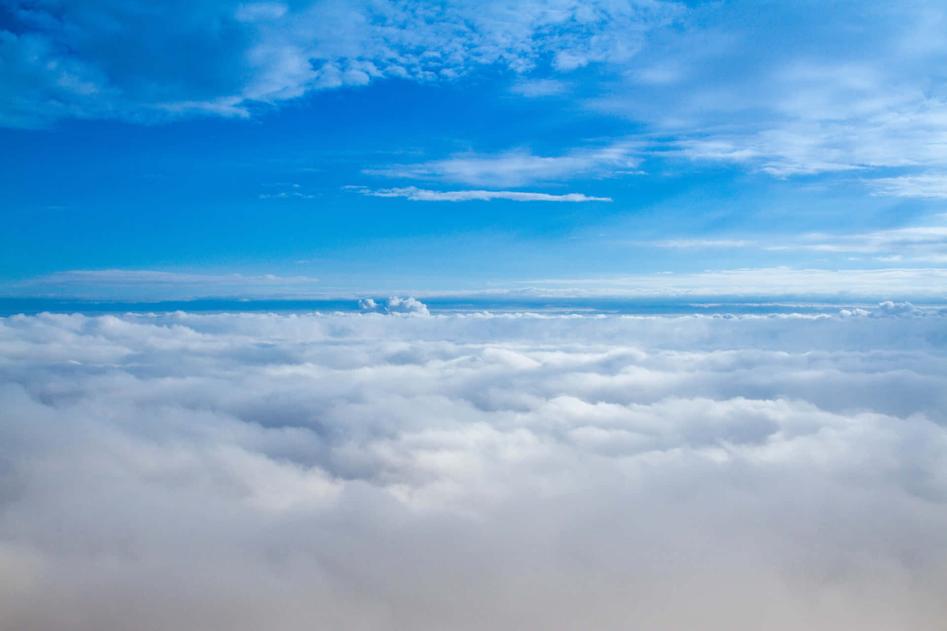 Breath taking view of the sky and clouds from the peak of Mount Everest