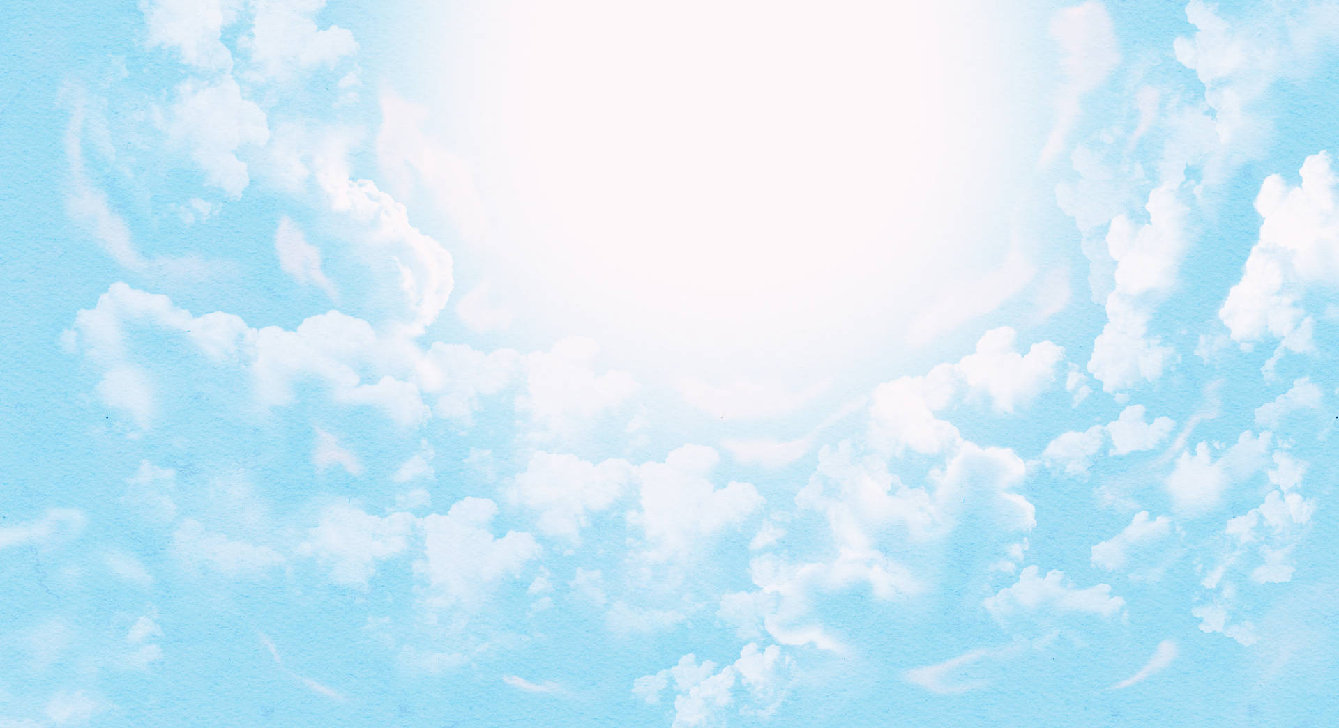 A Vast Blue Sky Surrounds the Heavenly Clouds Wallpaper
