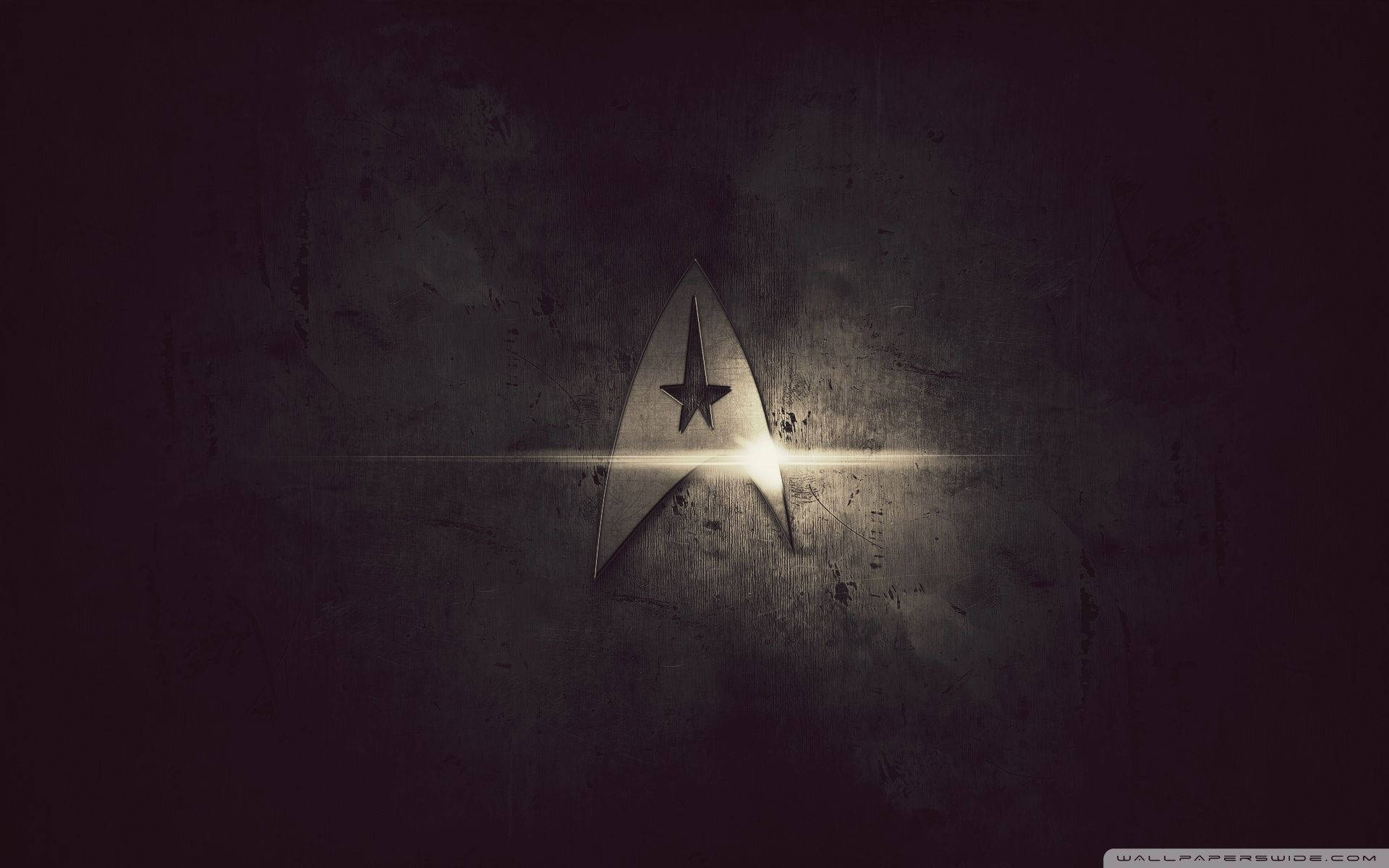 Amazing wallpaper of Star Trek logo with heavy metal style.
