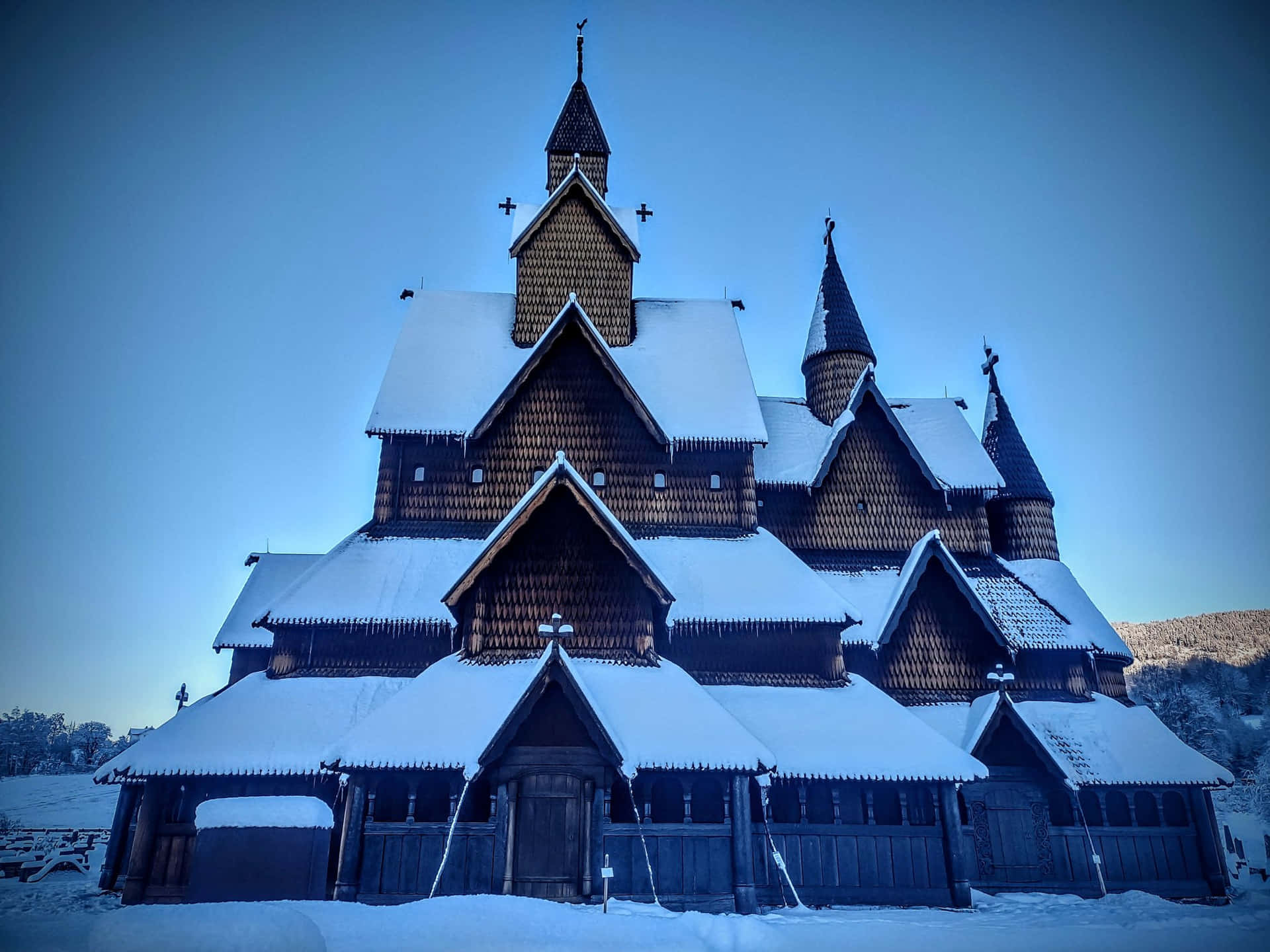Heddal Stave Church With Snow And Vignette Wallpaper