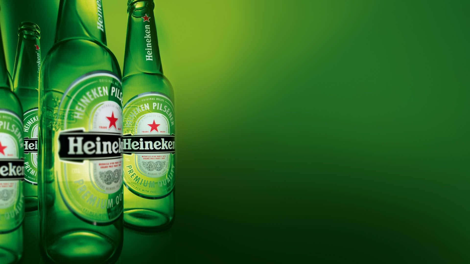 Cold Heineken Beers Lined Up on a Wooden Table