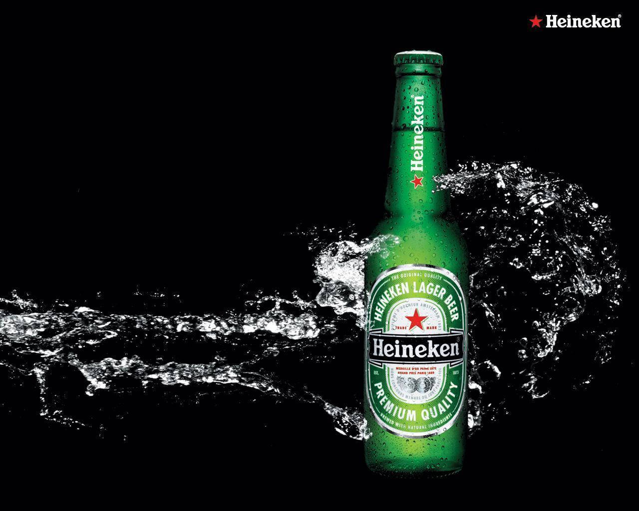 Heineken Lager Beer With Water Splashing Effect Wallpaper