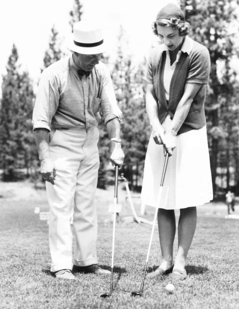 Helen Wills Playing Golf with Tom Nicholl in 1937 Wallpaper