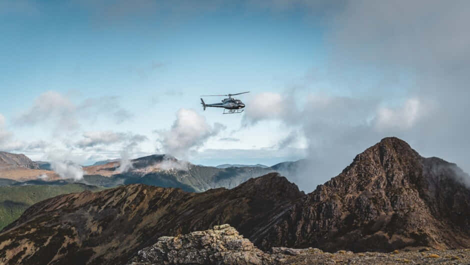 Helicopter Over Mountain Ridge Wallpaper