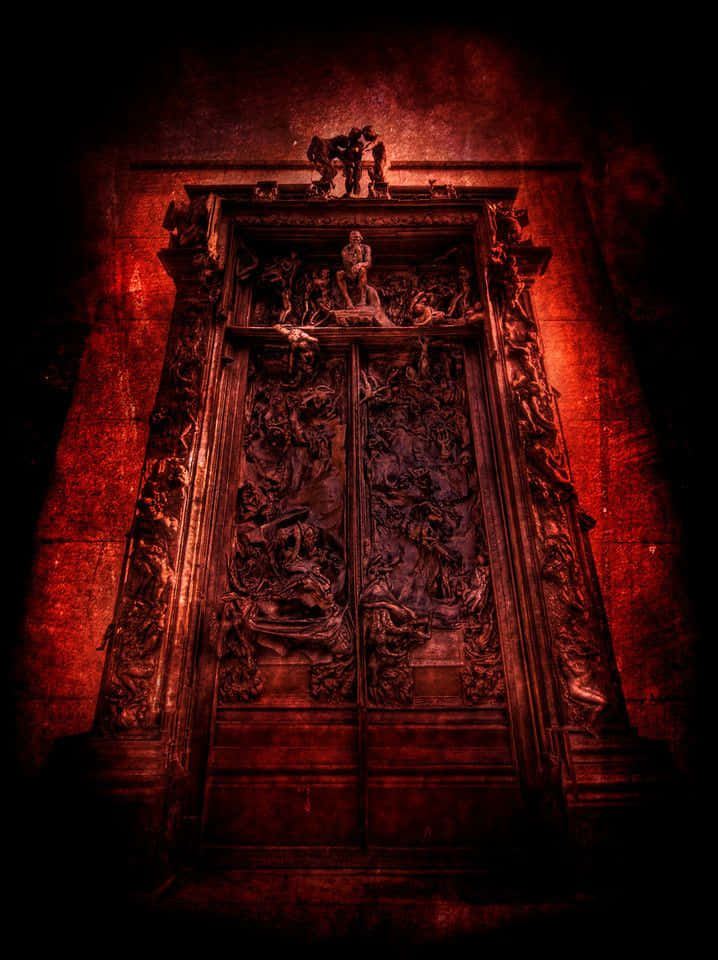 A Dark Door With Ornate Carvings