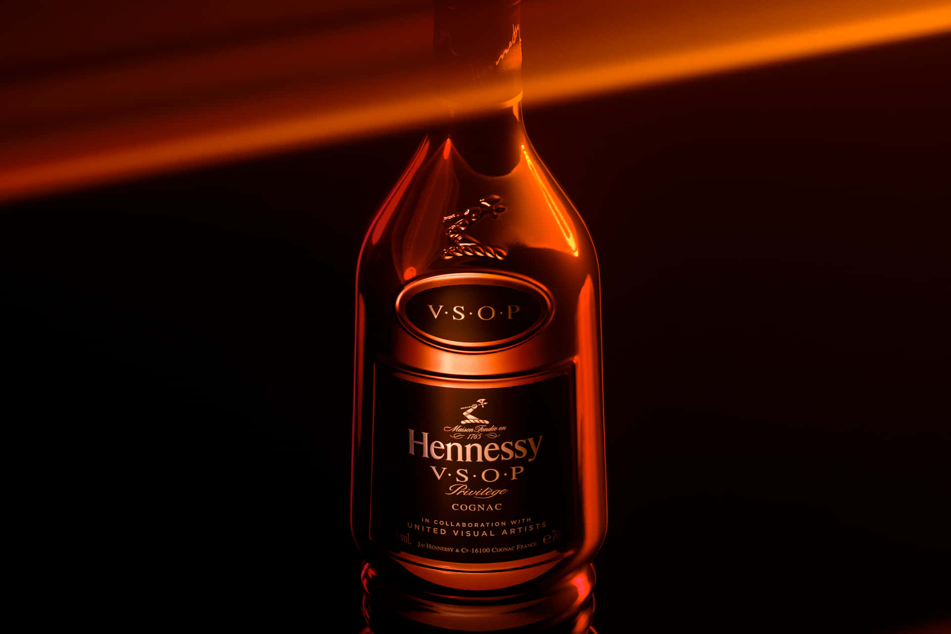 A Bottle Of Henry Scotch Is Shown On A Dark Background Wallpaper