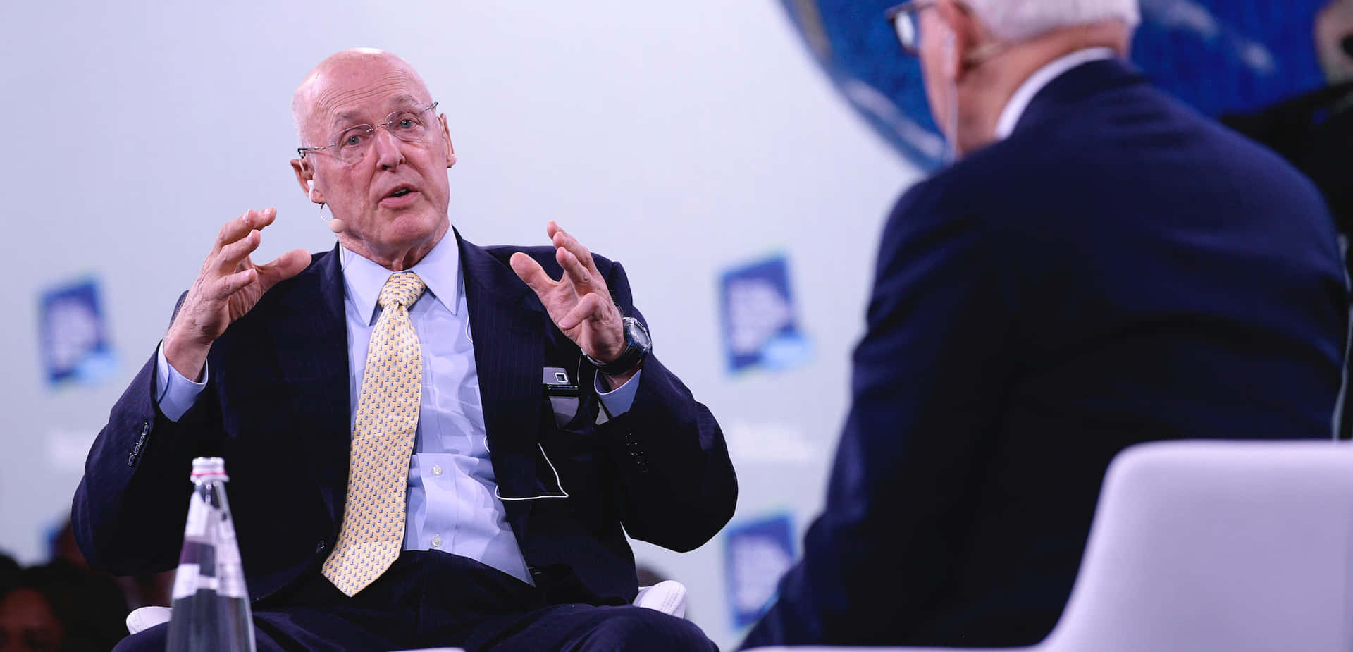 Henry Paulson During Panel Interview Wallpaper