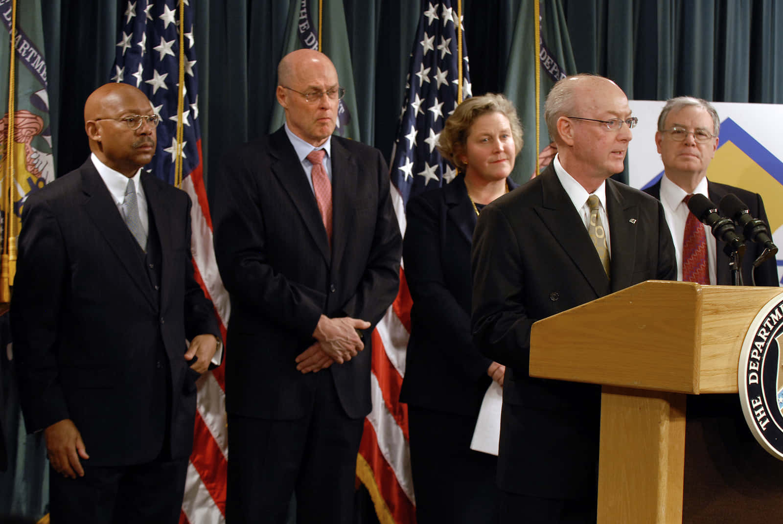 Former United States Secretary of the Treasury, Henry Paulson, meeting with Treasury personnel. Wallpaper