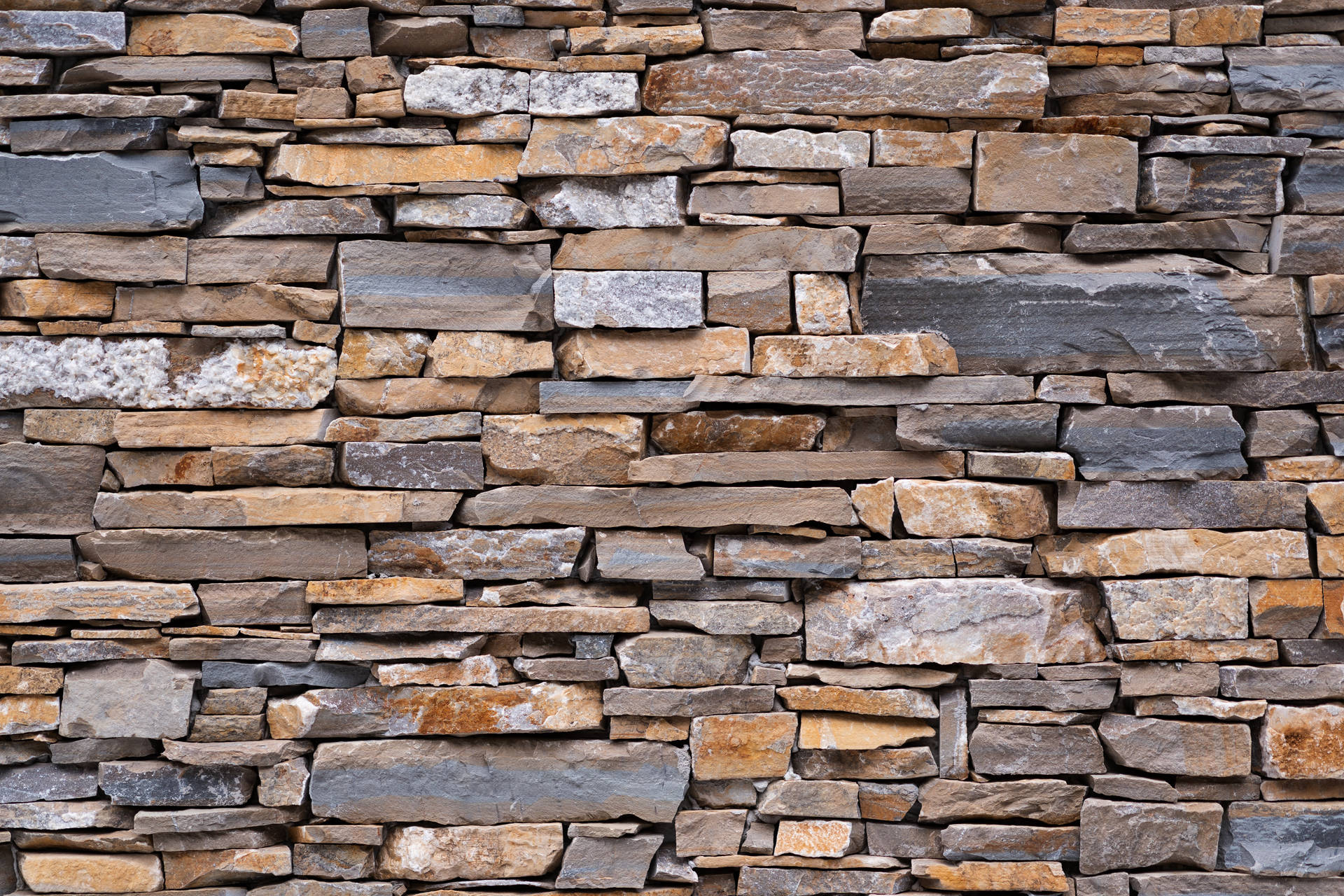 Caption: Captivating Hi-Res Texture of a Stone Wall Wallpaper