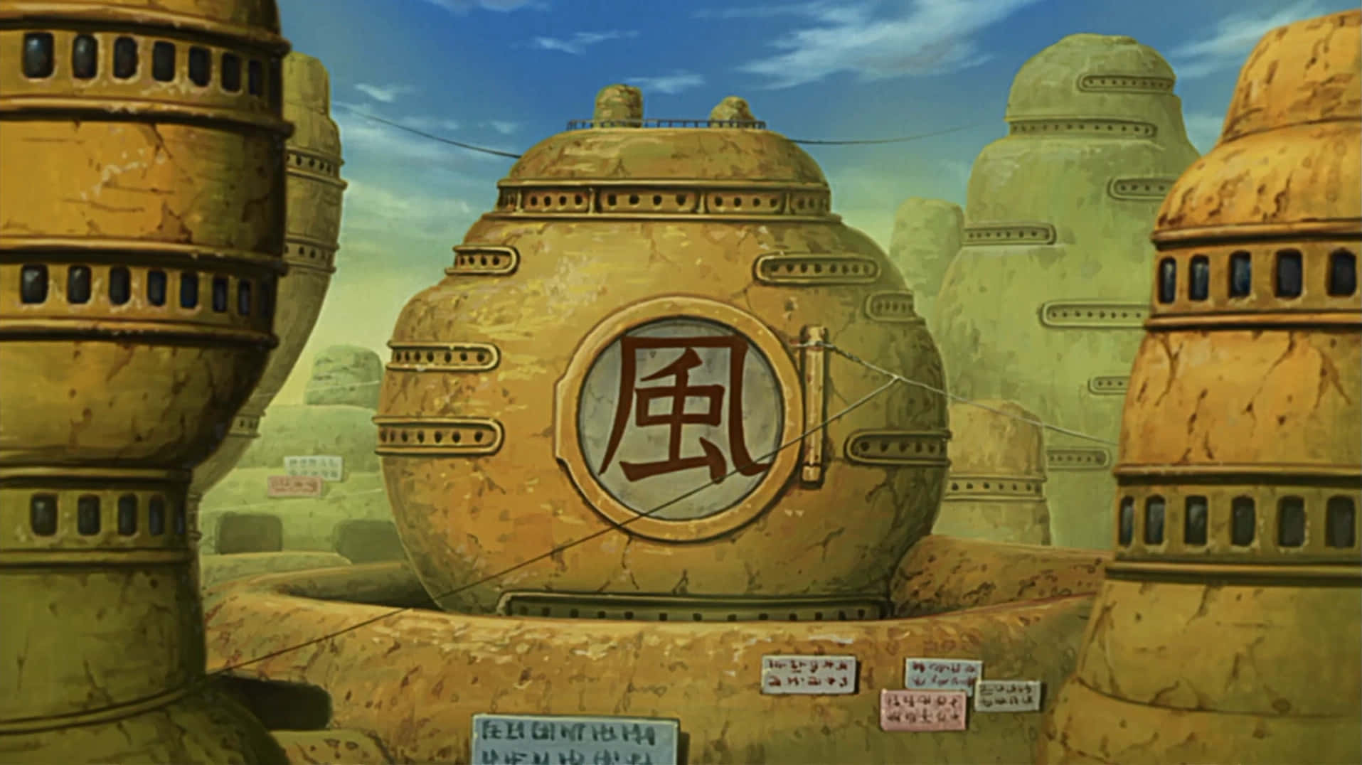 A Scenic Sunset View of the Hidden Sand Village Wallpaper