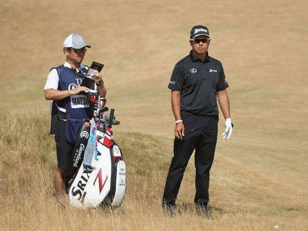 Hideki Matsuyama And Caddie On Dry Golf Course Wallpaper