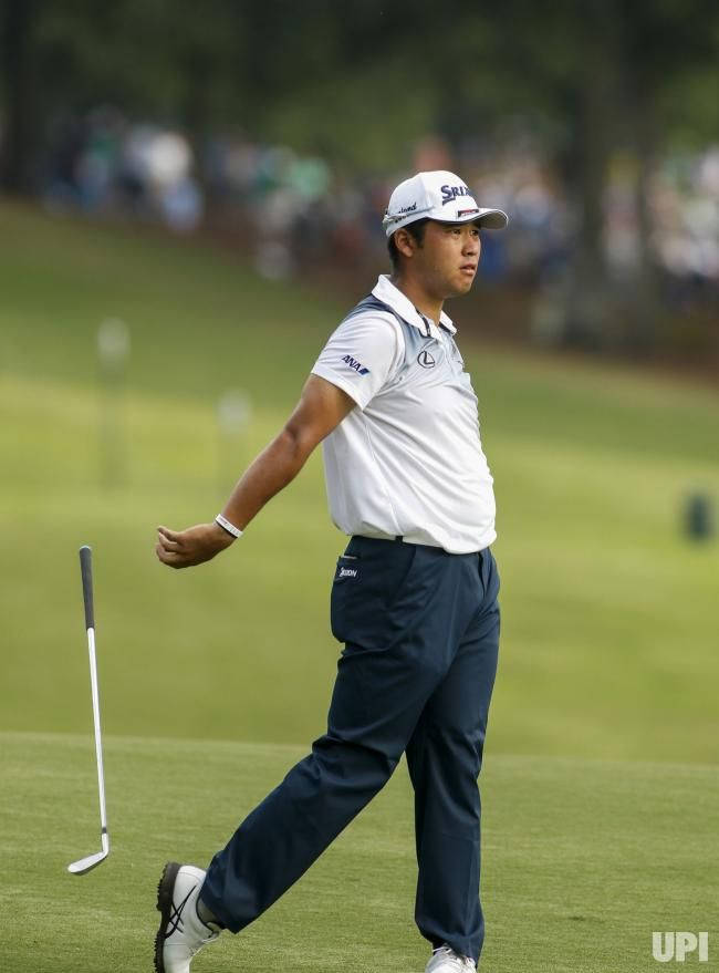 Hideki Matsuyama Letting Go Of Golf Club Wallpaper