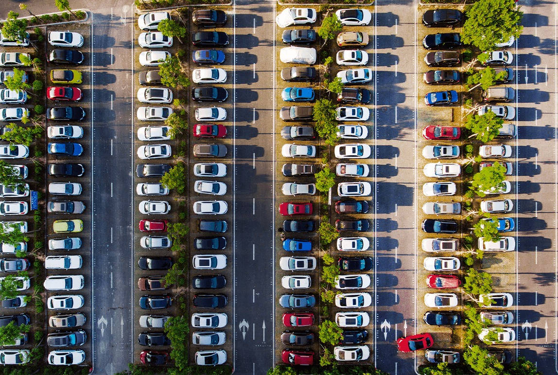 High-angle Shot Of Organized Parking Lot Wallpaper