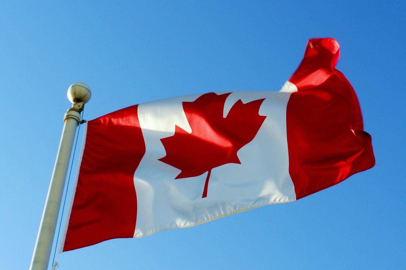 Vibrant and Proud - The Canadian Flag at its Finest Wallpaper