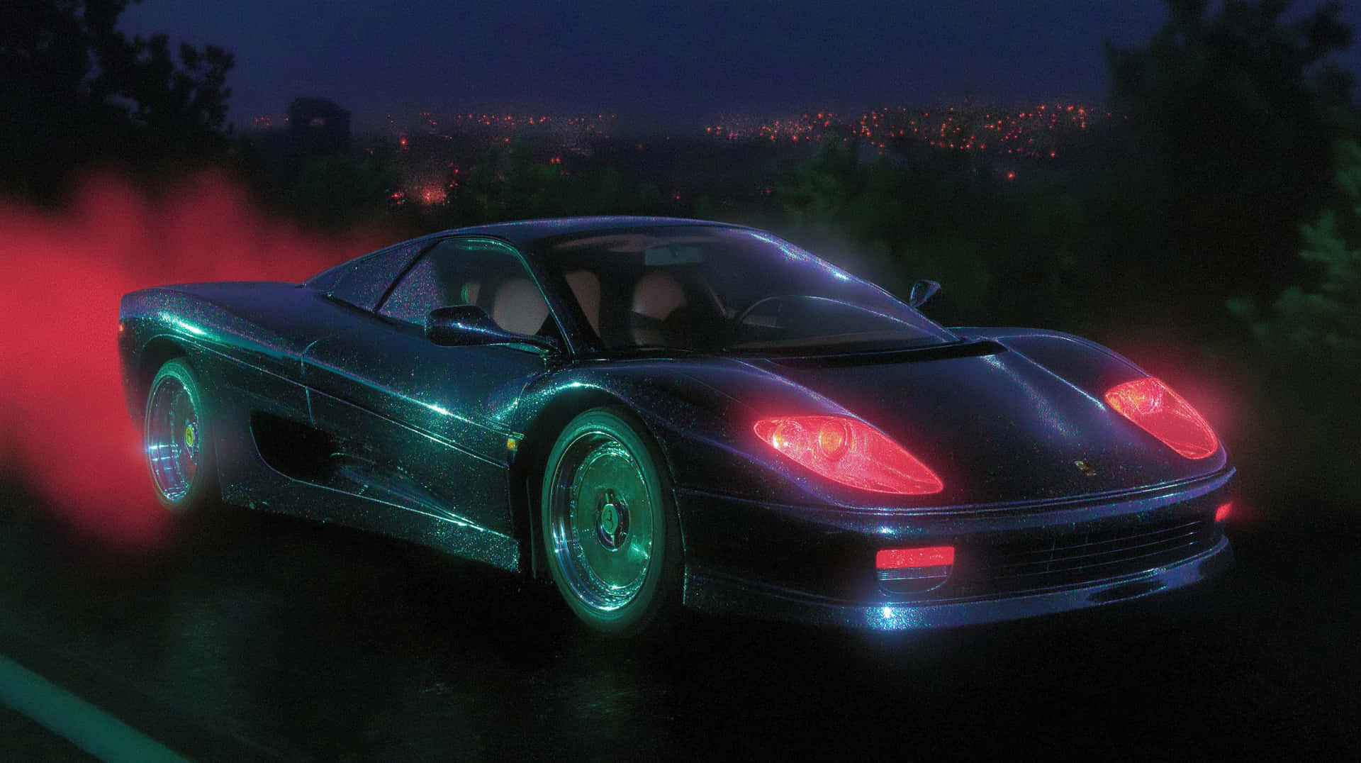 High-performance Automobile On A Dynamic Night Drive Wallpaper