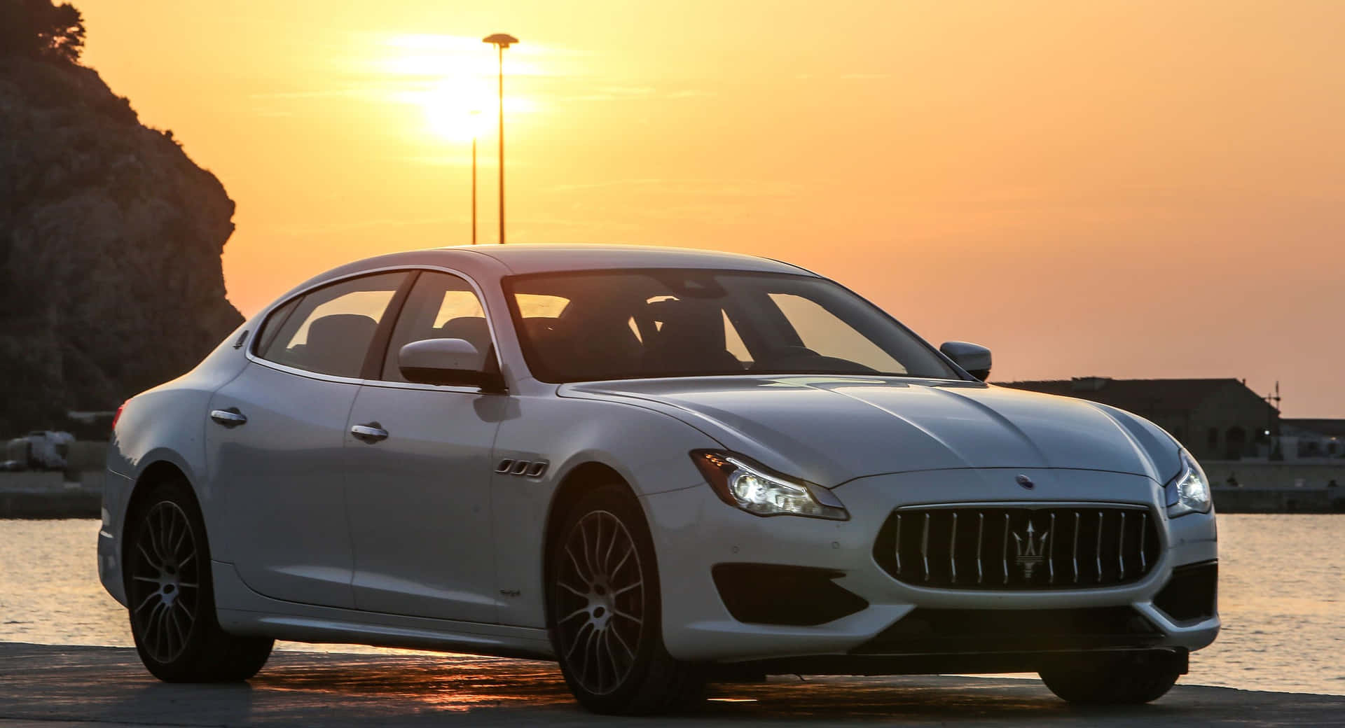 High-performance Maserati Quattroporte In Majestic Atmosphere Wallpaper