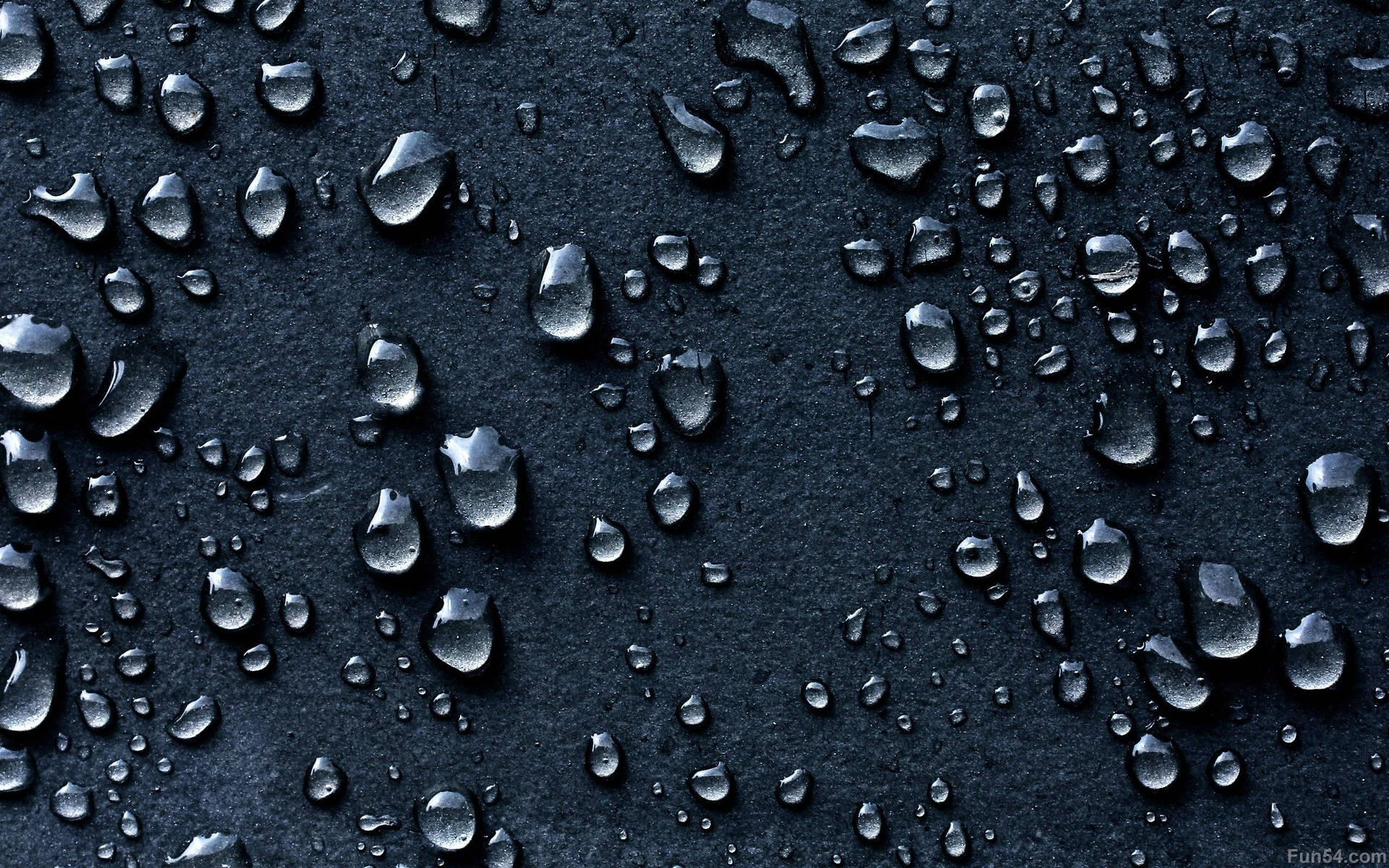 Captivating Close-up of Dark Water Droplets Wallpaper