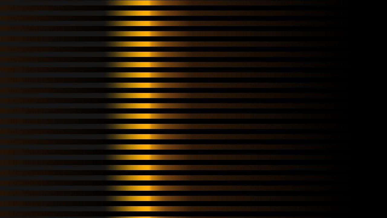 Bright, Shiny Gold on a Dark Black Background