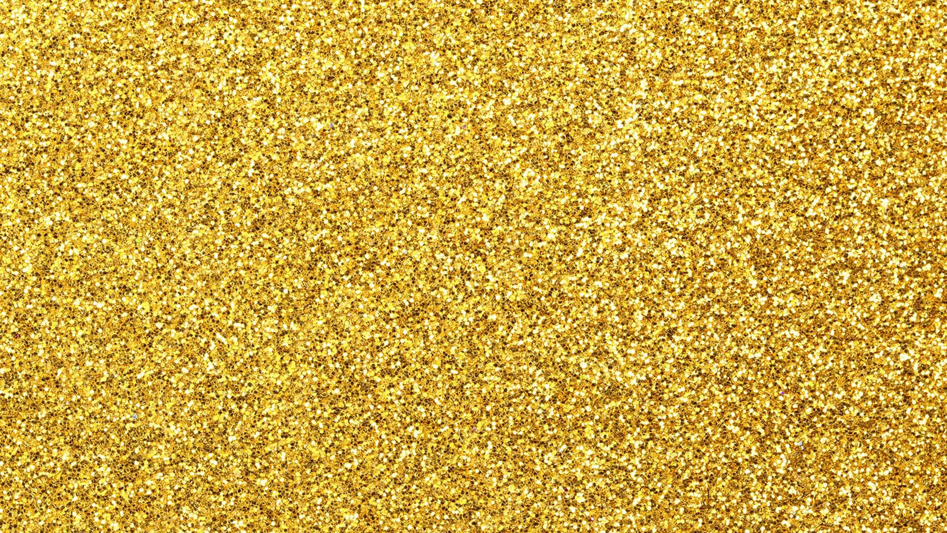 A dazzling golden glitter background perfect for any special occasion.