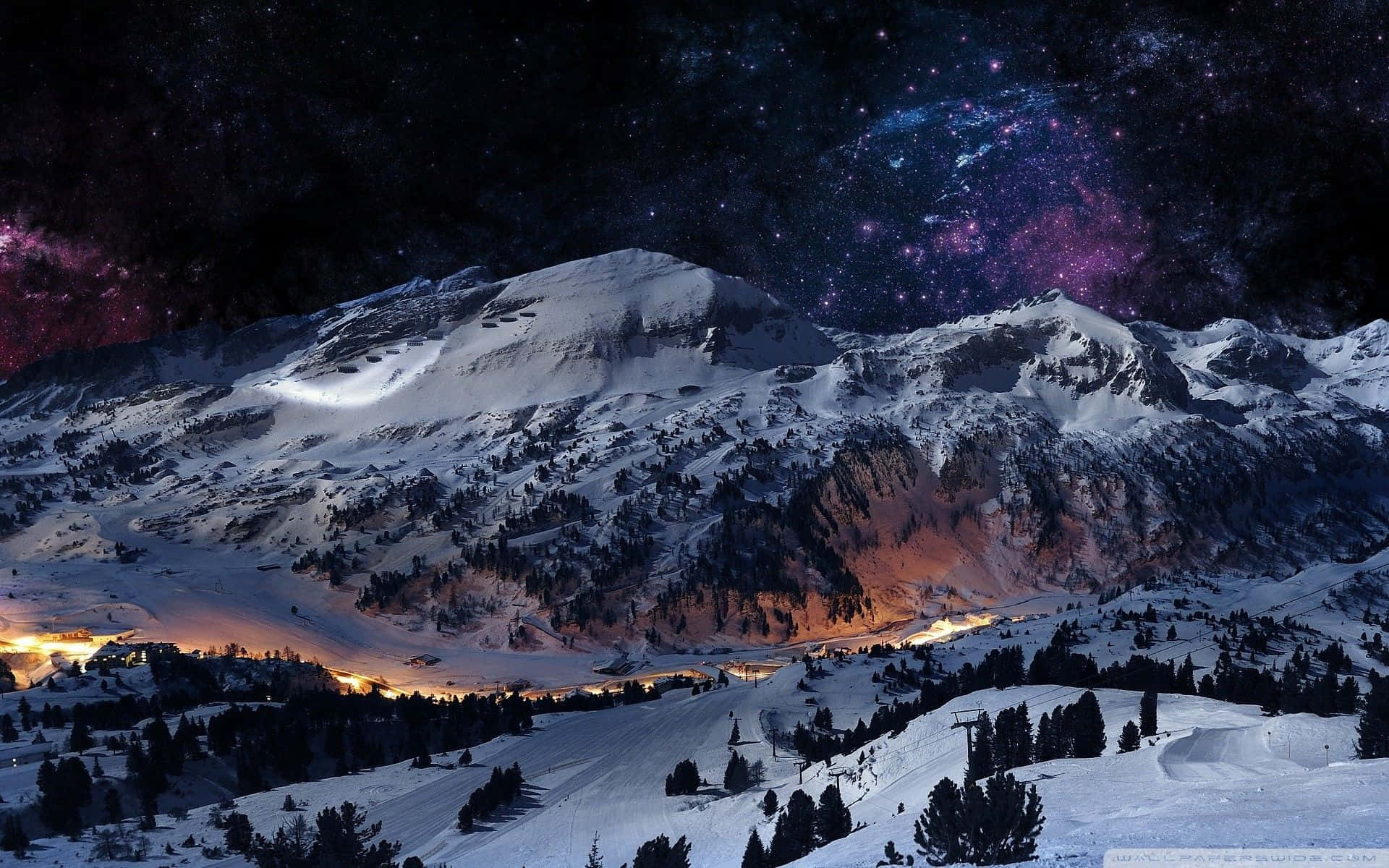 A Mountain With Snow And Stars In The Sky