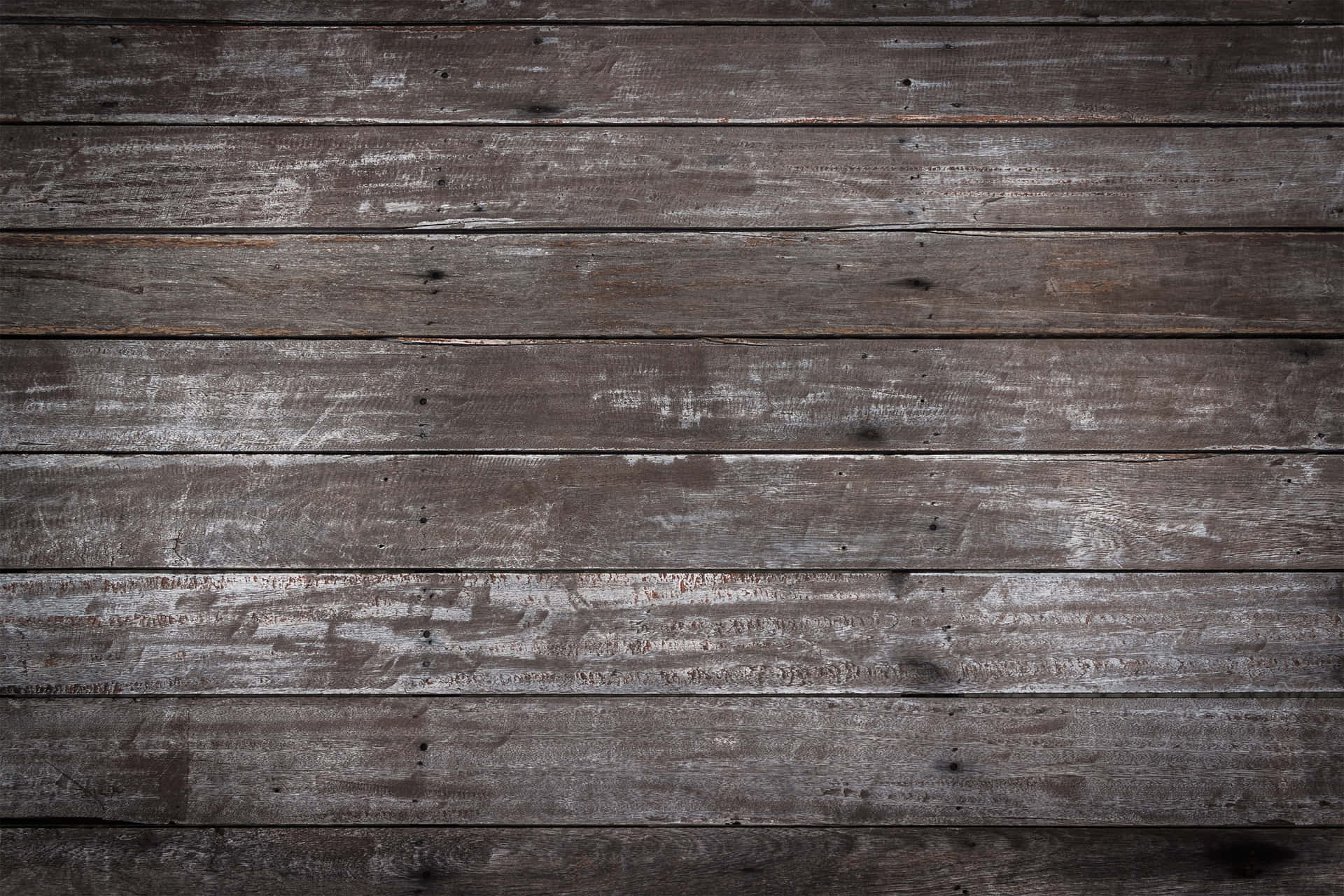 Brown wooden background with textured grain