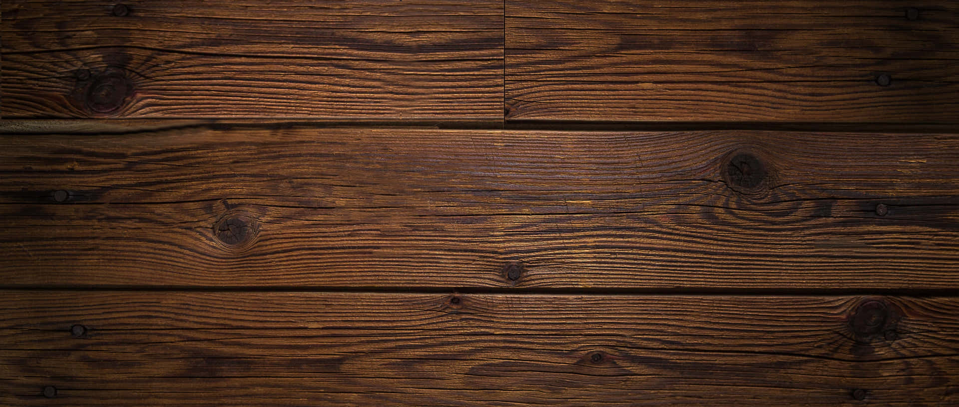 A Wooden Wall With A Dark Brown Color