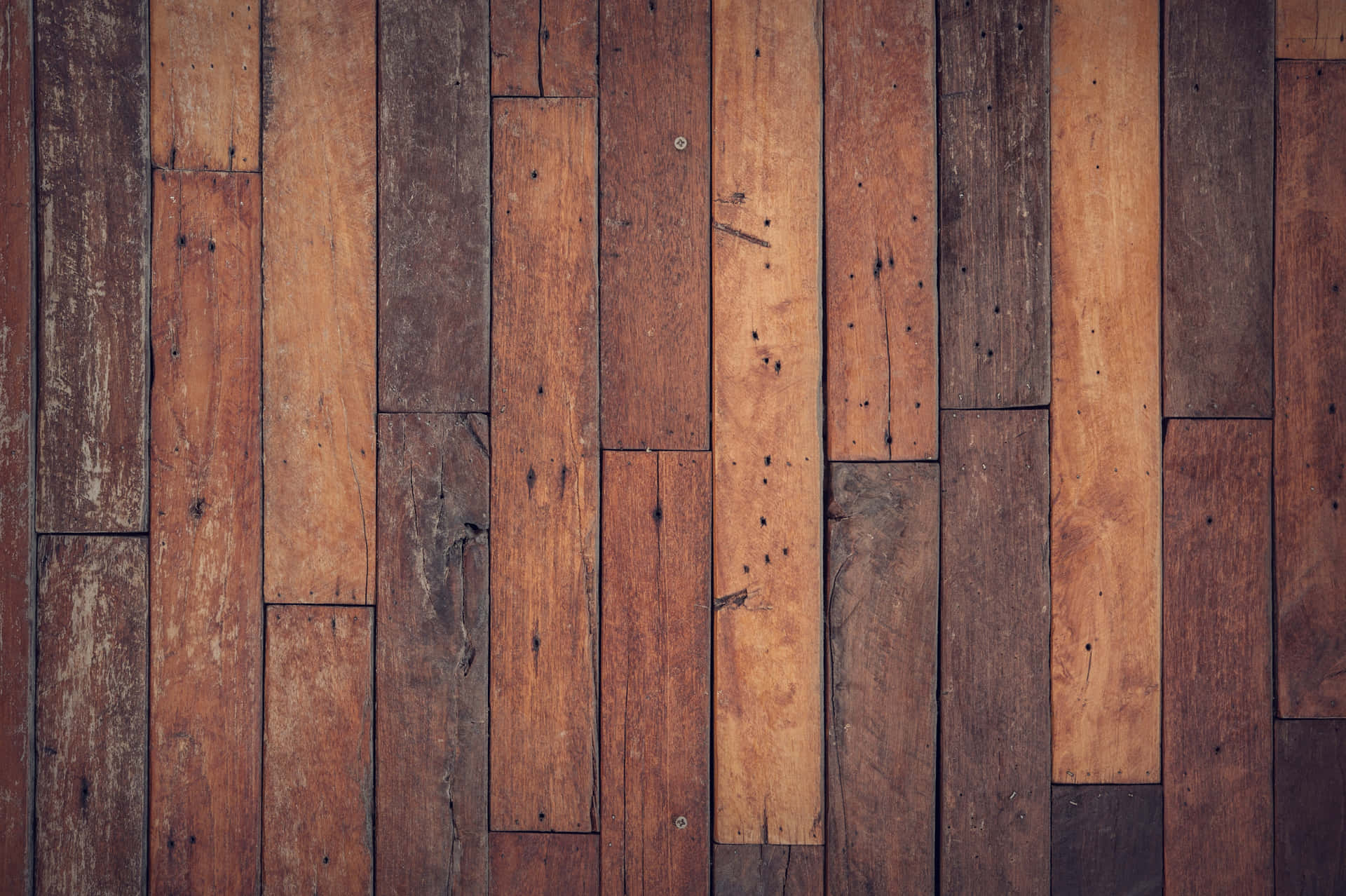 A Wooden Floor With Brown And Brown Stripes