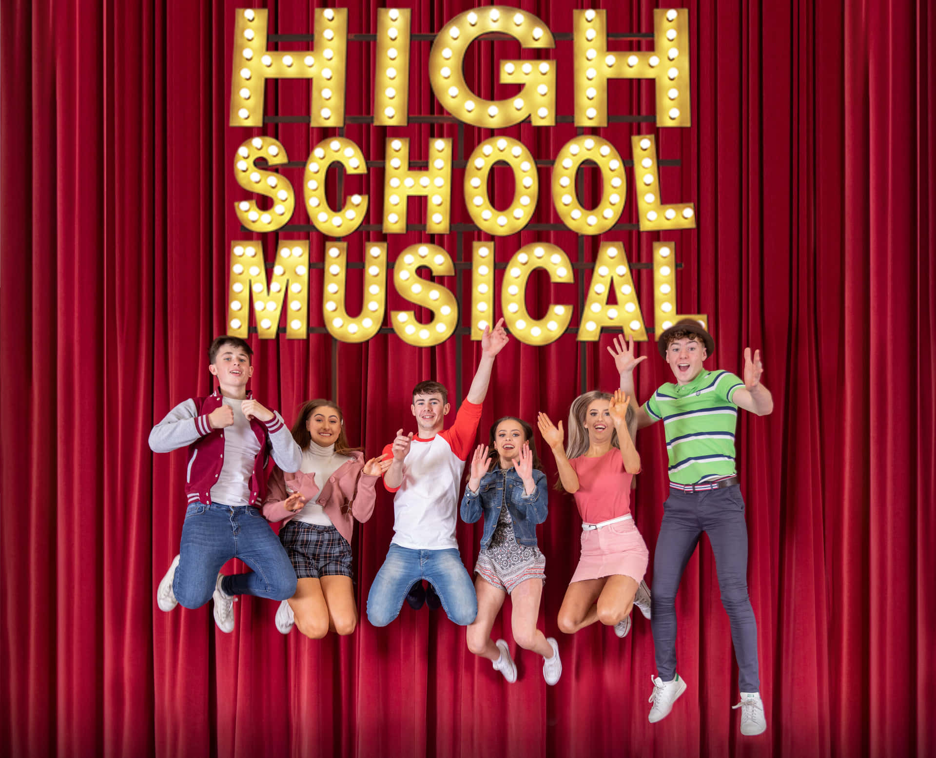 High School Musical stars singing and dancing on stage