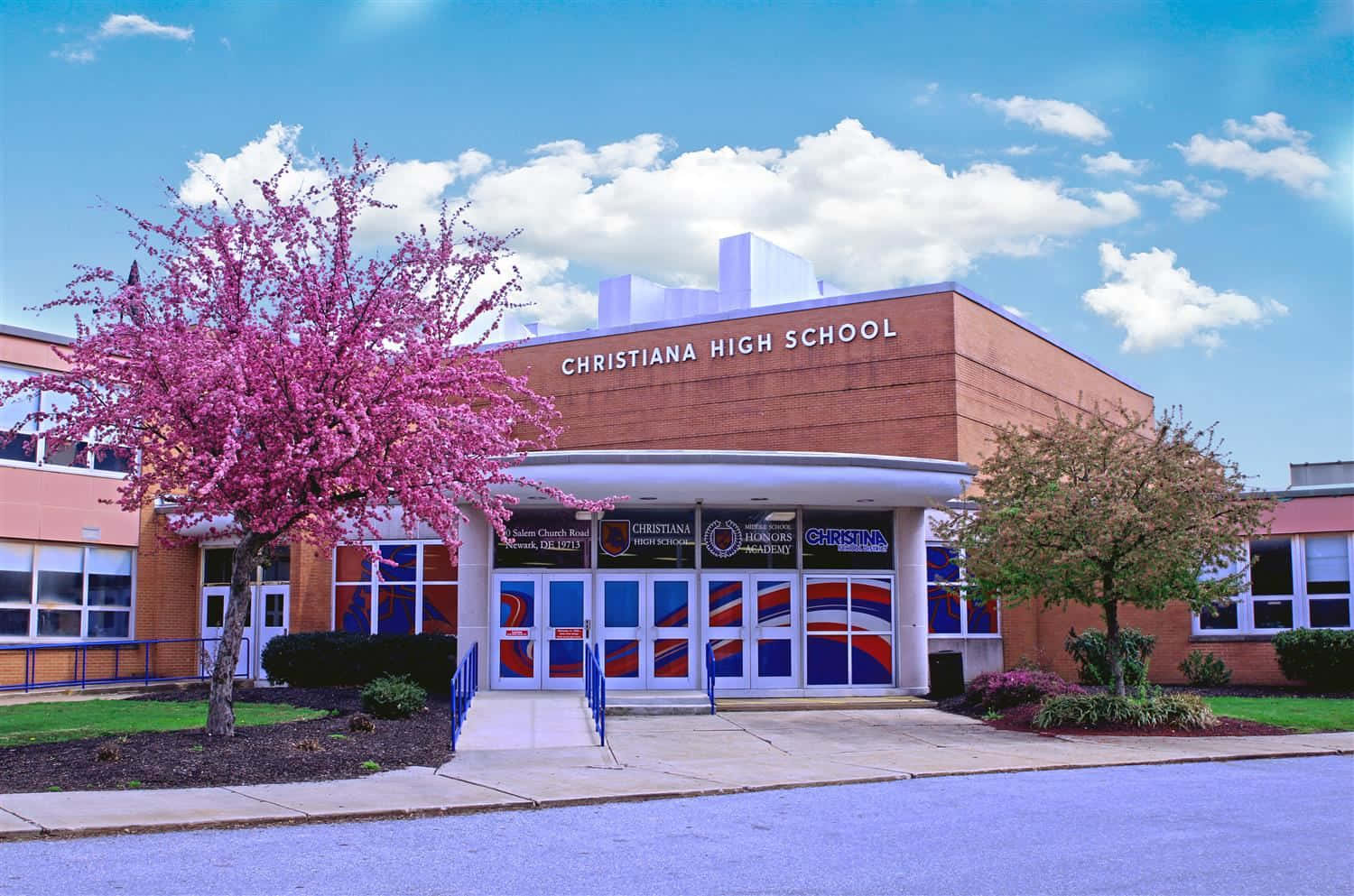 A School Building With A Blue And White Color Scheme