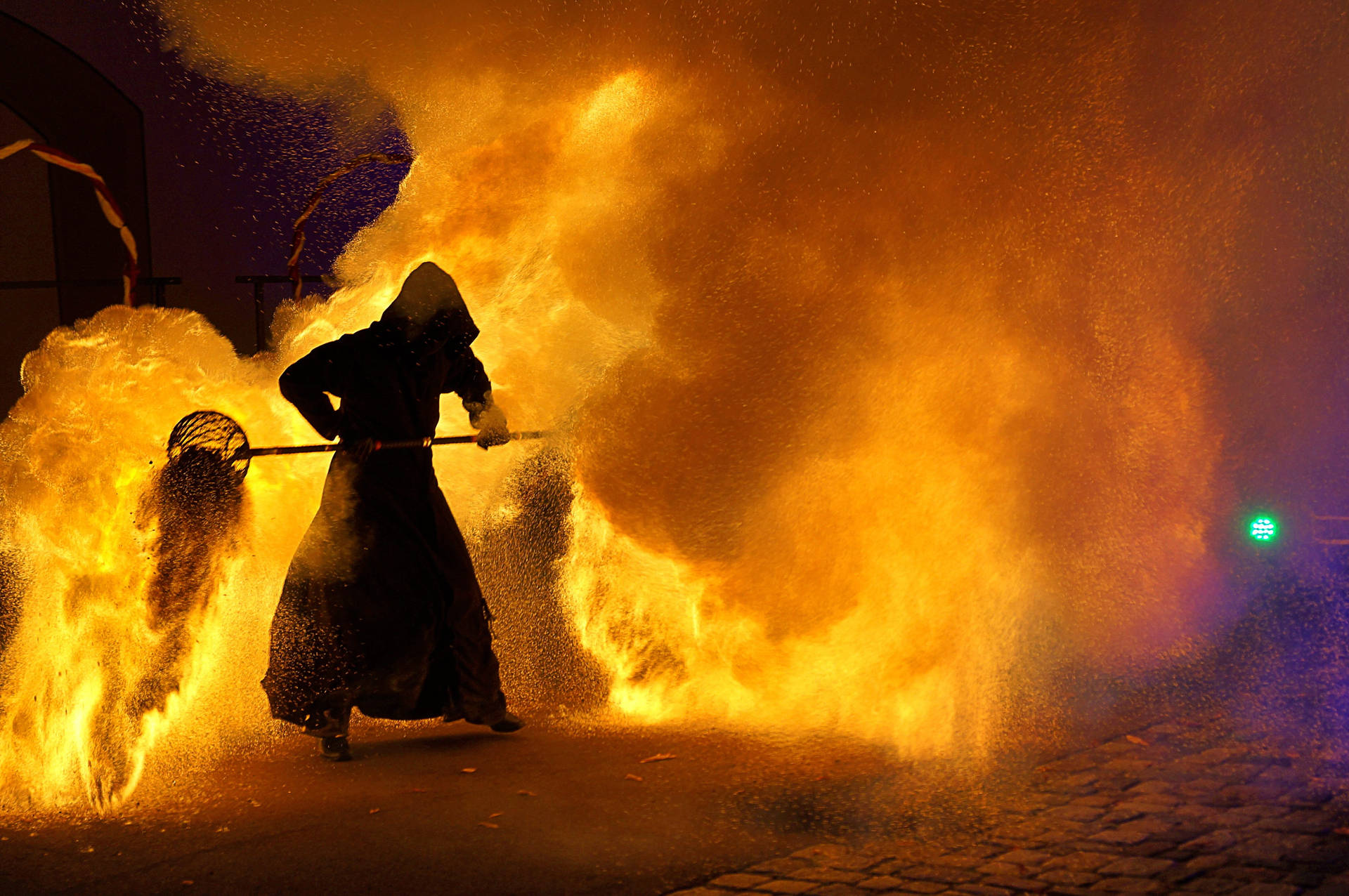 High Temperature Fire And Hooded Man Background