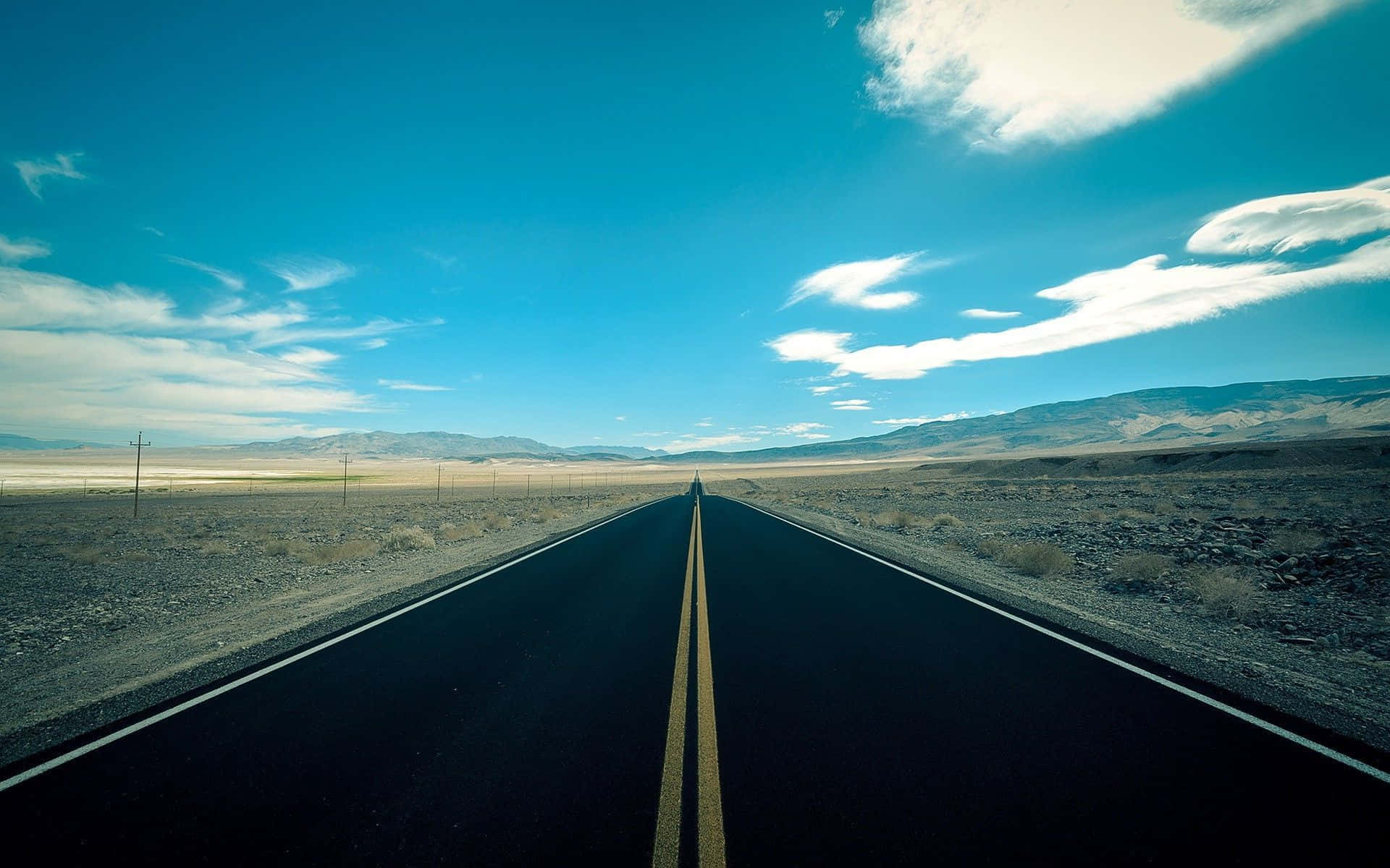 Highway In The Middle Of A Desert Wallpaper