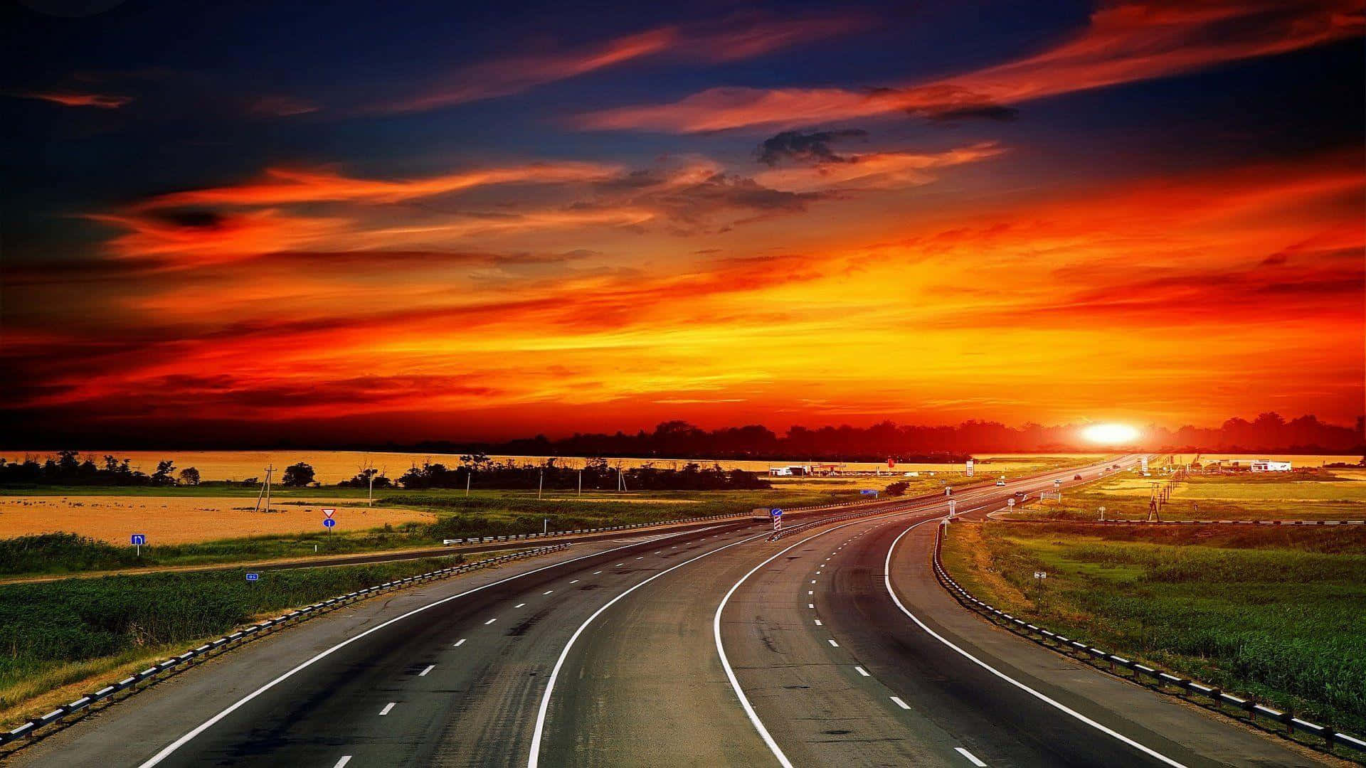 A Highway With A Sunset