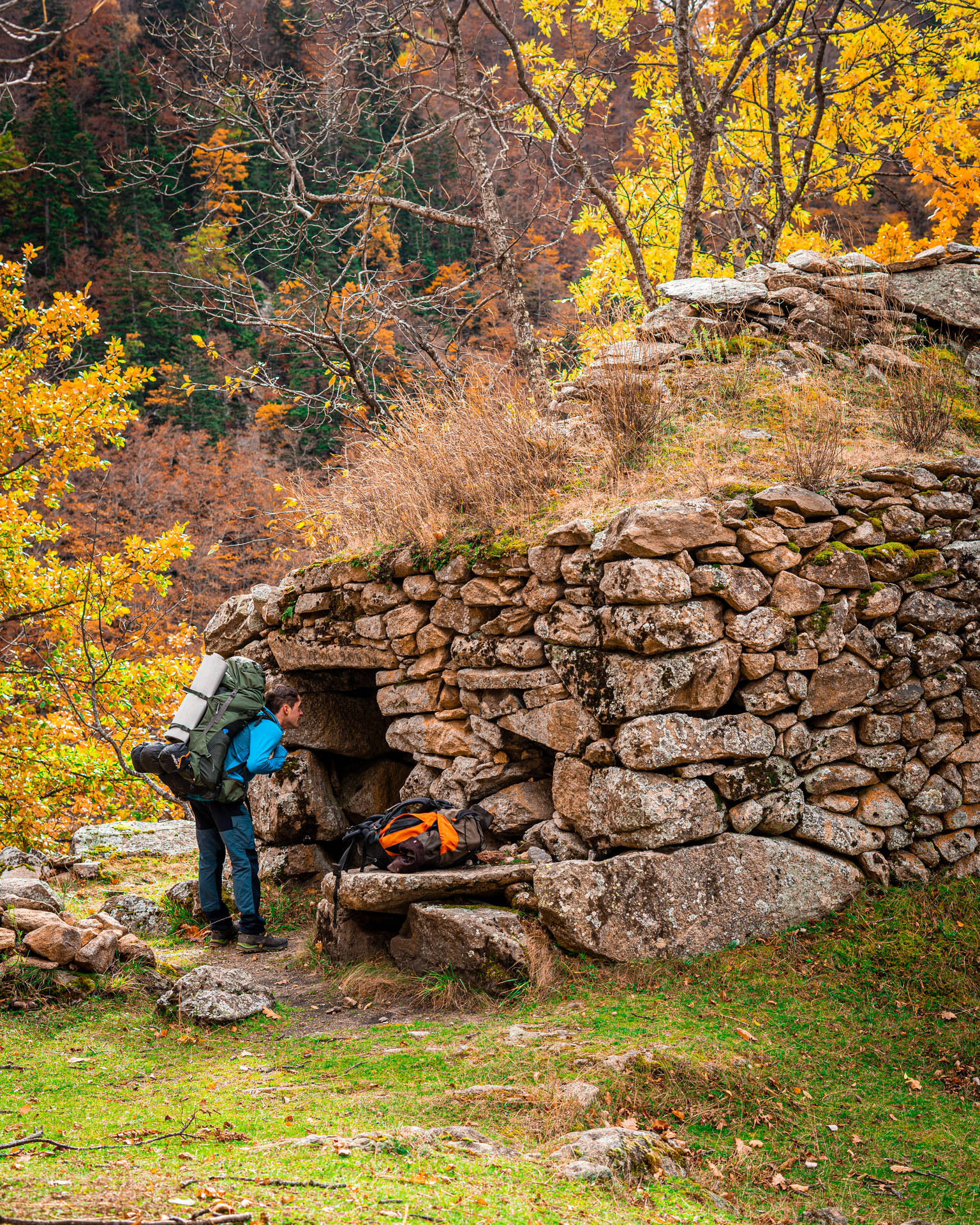 Hiker And Stone Cave Best Autumn Wallpaper