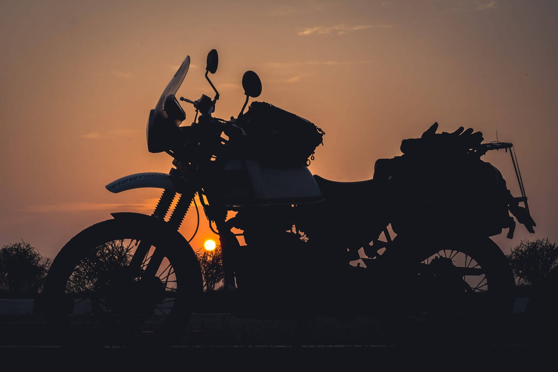 Himalayan Bike And Sunset Background