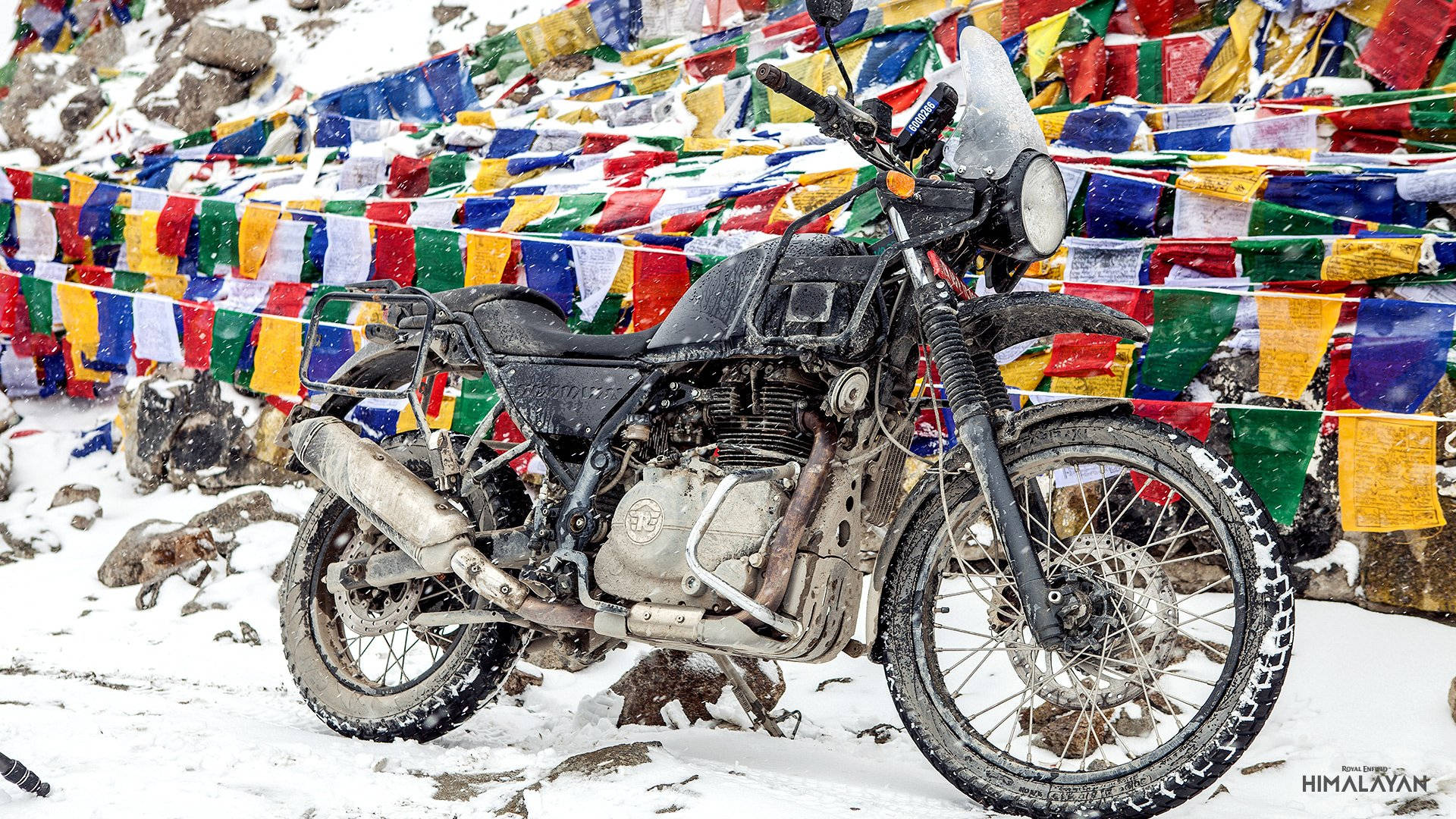 Himalayan Bike In Snow Background