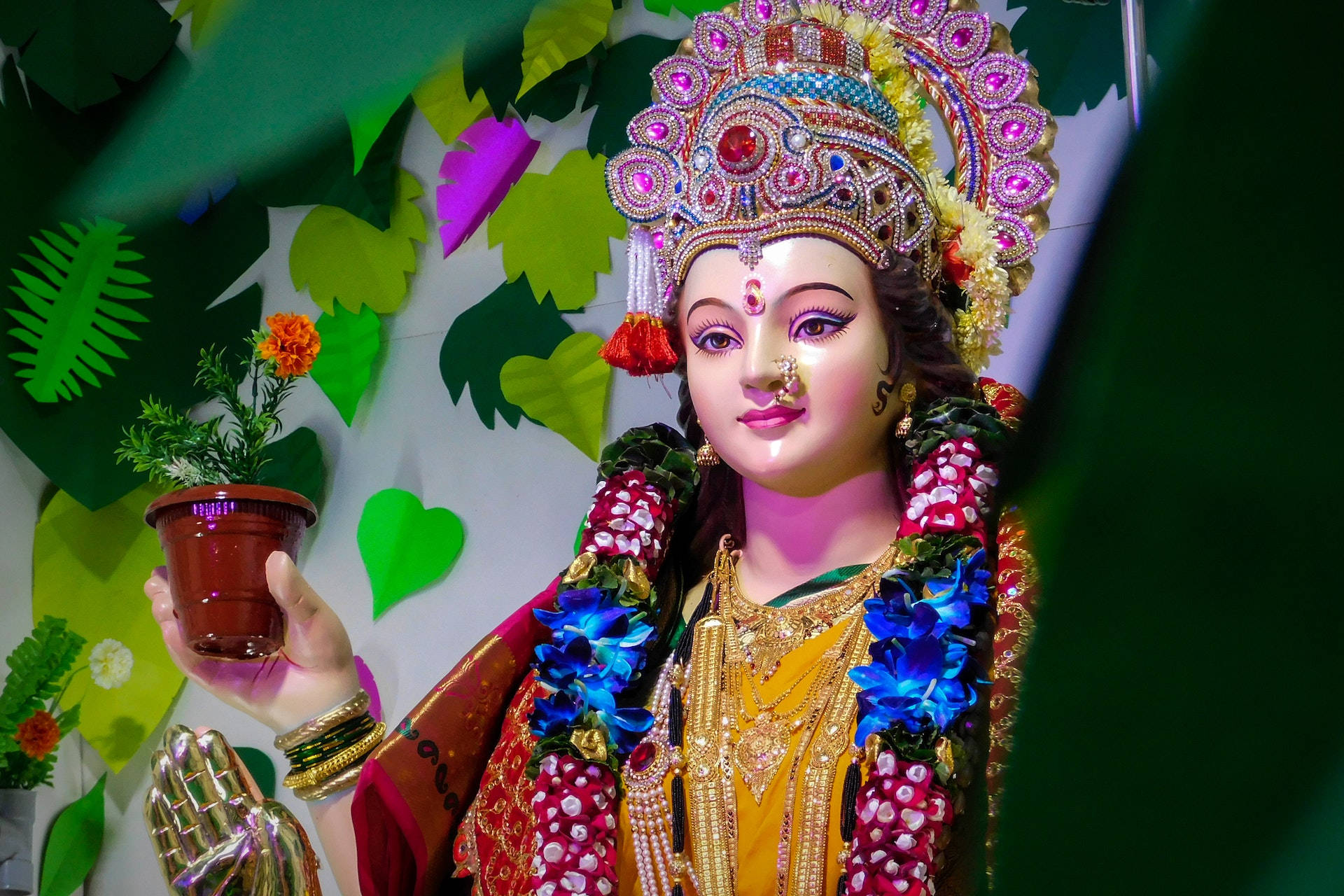 Hindu Goddess Durga Holding Potted Plant Wallpaper