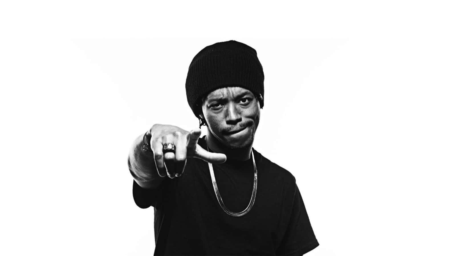 Hip Hop_ Artist_ Pointing_ Black And White Wallpaper