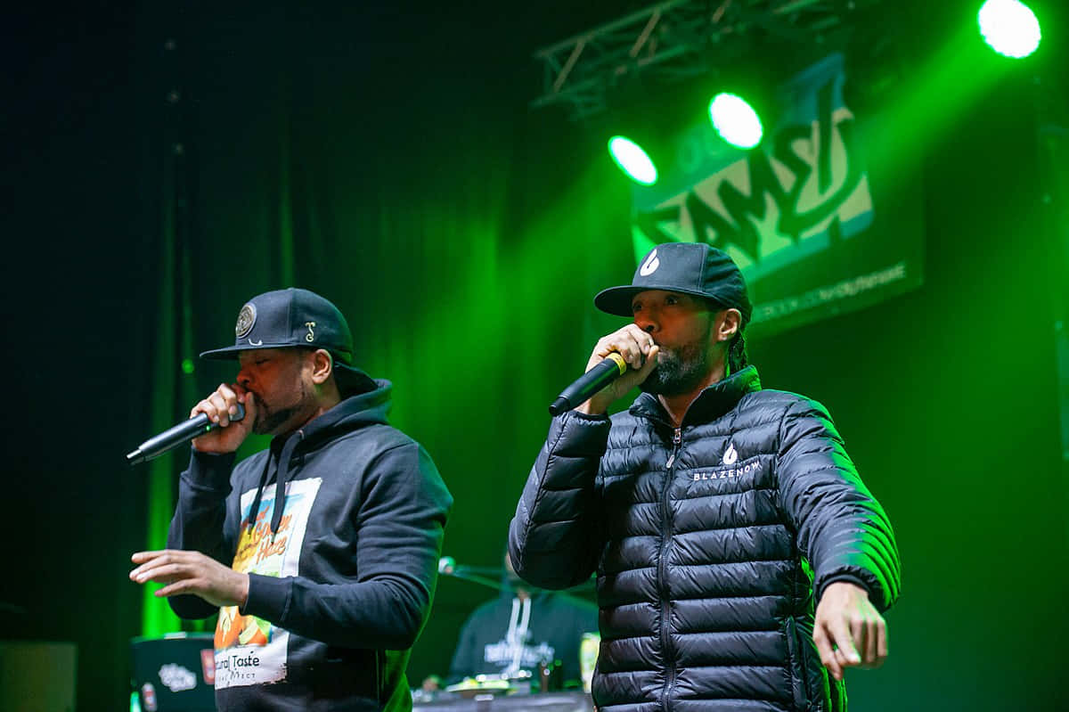 Hip Hop Duo Performing Liveon Stage Wallpaper