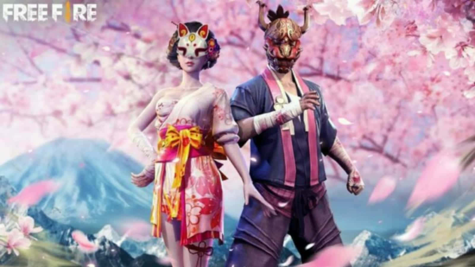 To personer iført kimono står foran et kirsebærblomsttræ Wallpaper