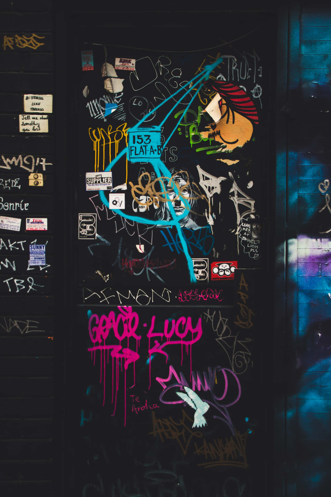 An expressive hip hop graffiti wall full of vibrancy and creativity. Wallpaper