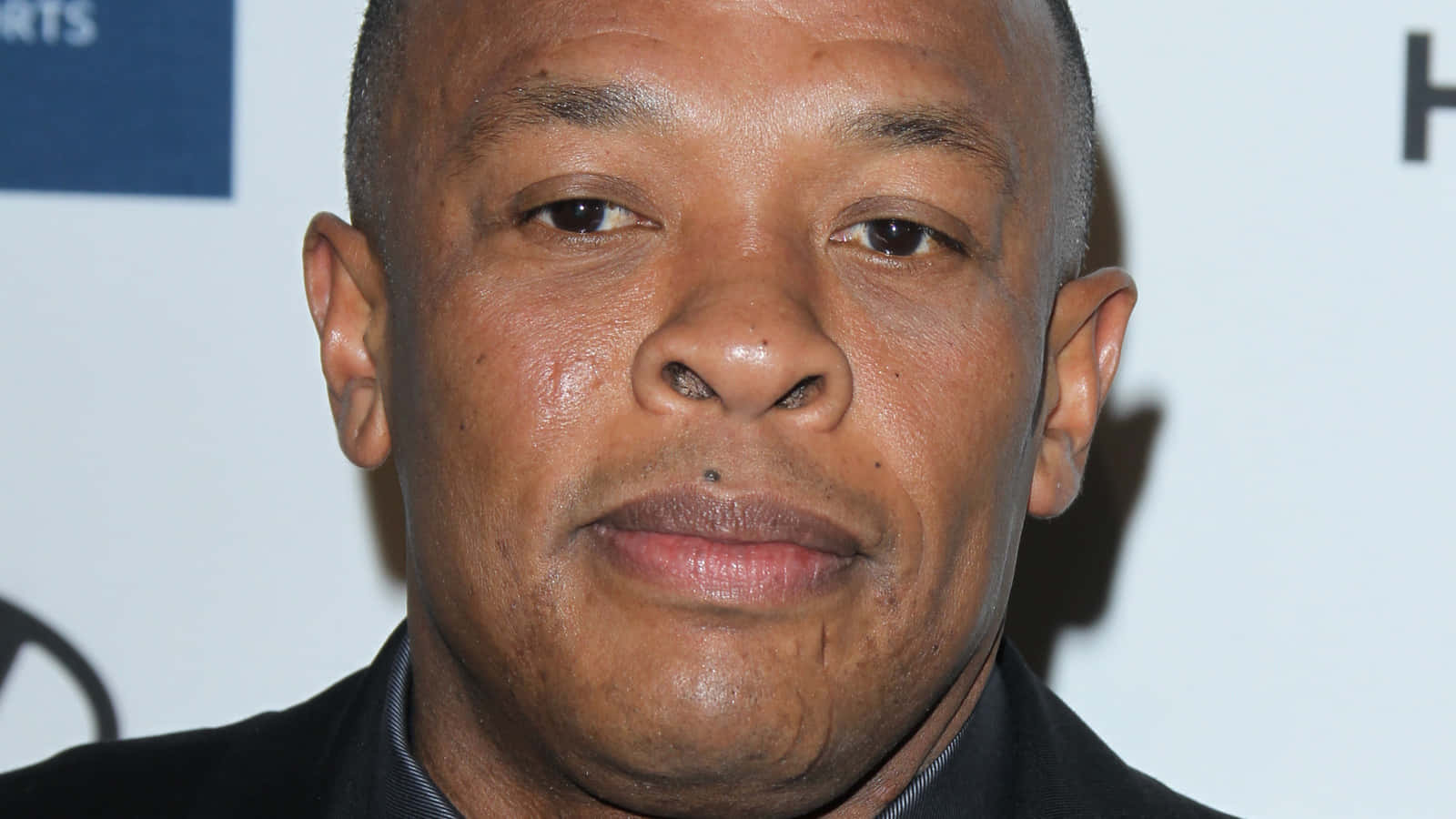 Hip-hop Icon Dr. Dre Performing On Stage Wallpaper