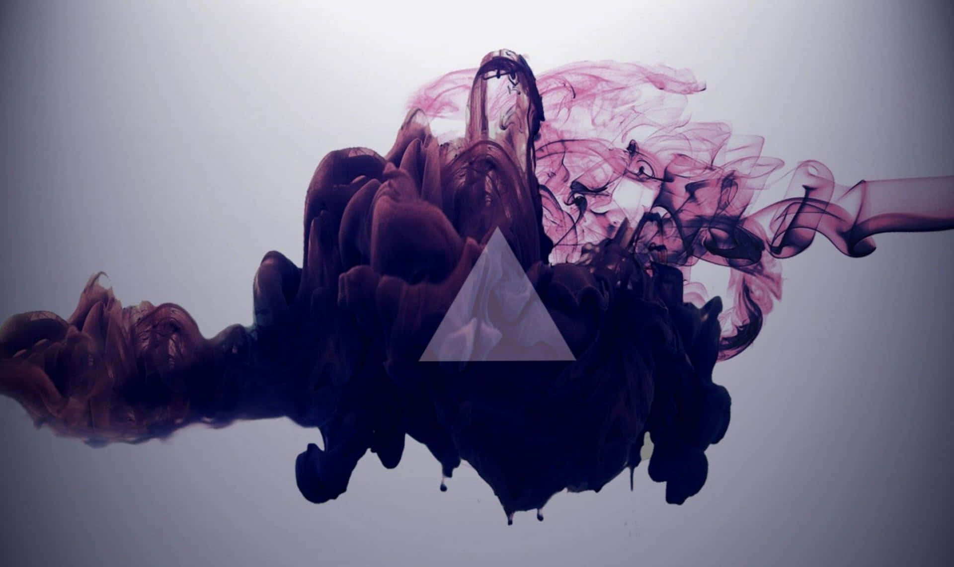 A Triangle With Purple Smoke Coming Out Of It Wallpaper