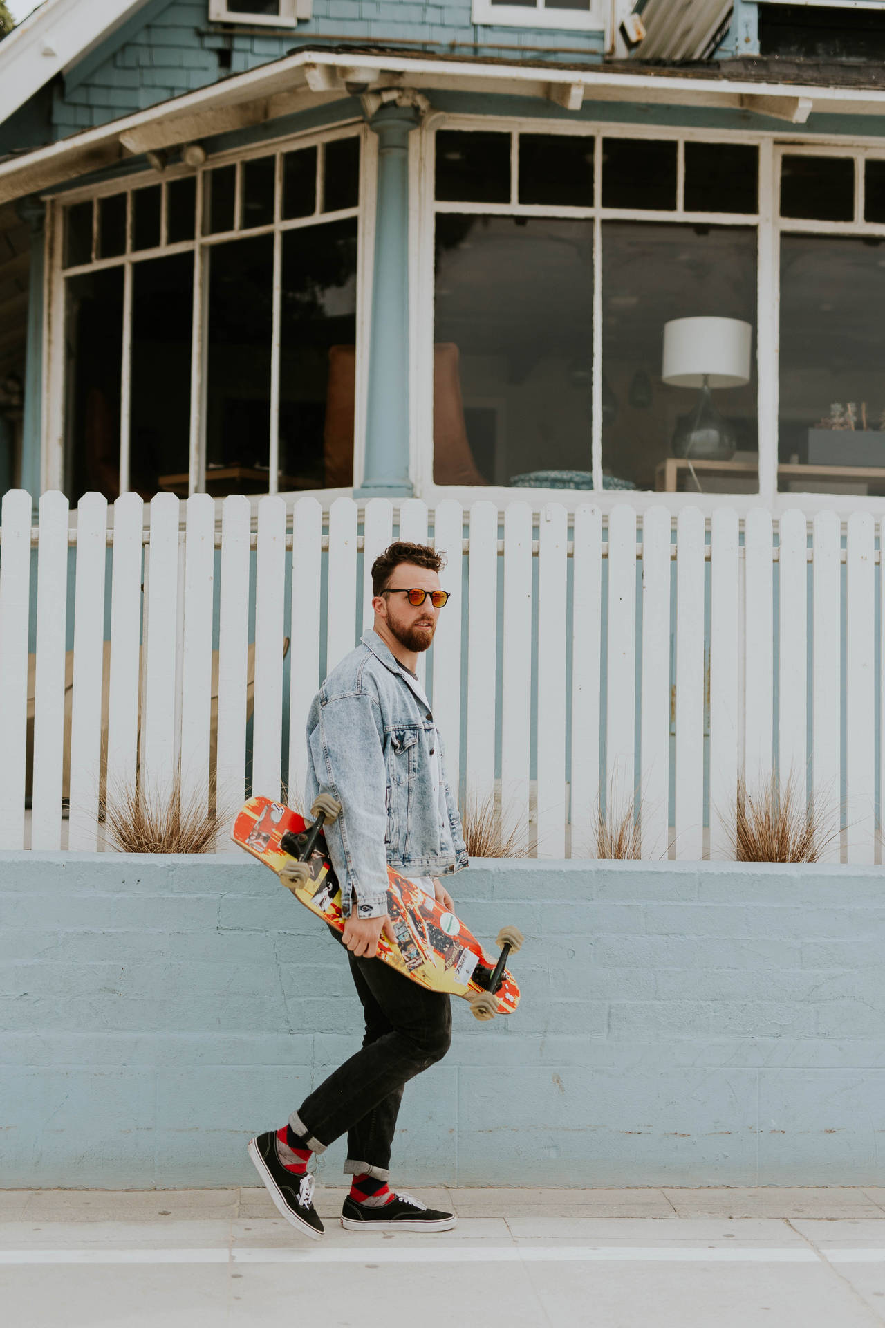 Hipster With Longboard Wallpaper