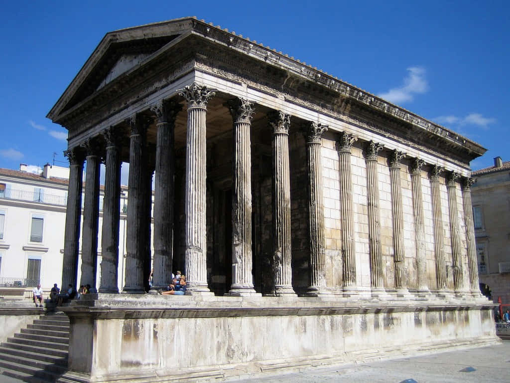 Historic Maison Carrée In The Daytime Wallpaper