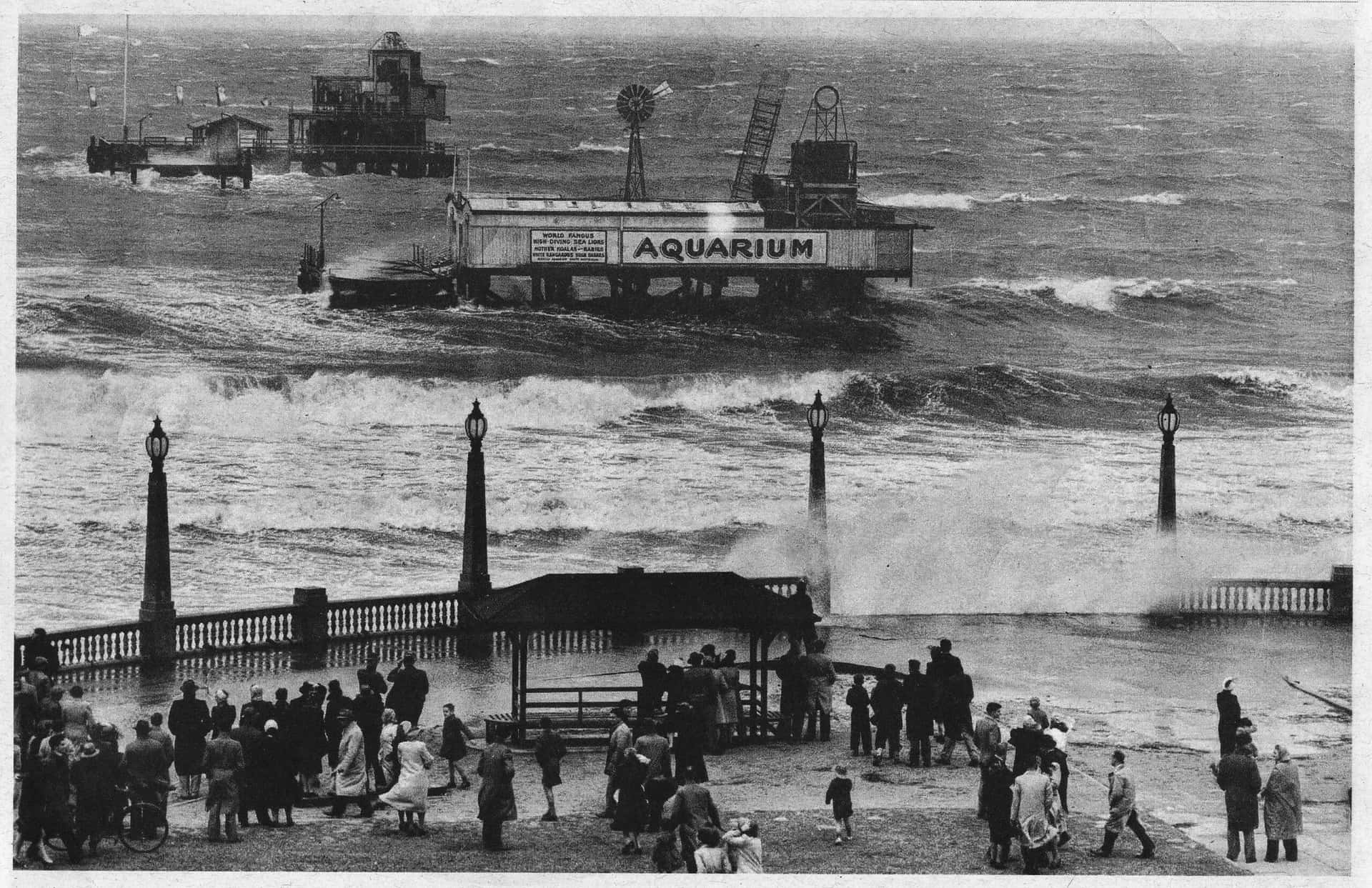 Download Historic Stormat Glenelg Pier Wallpaper | Wallpapers.com