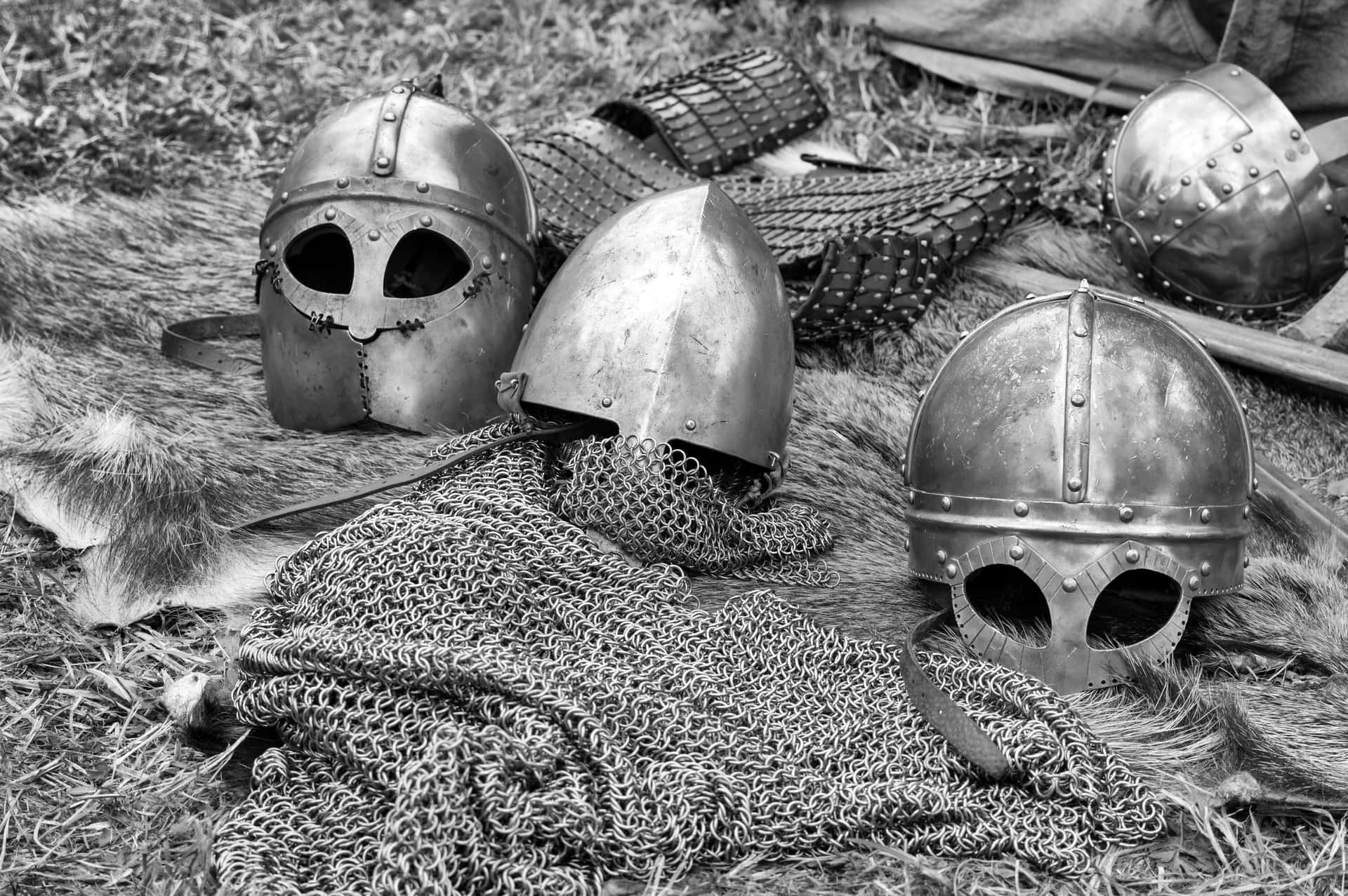 Viking Helmets And Shields On The Ground