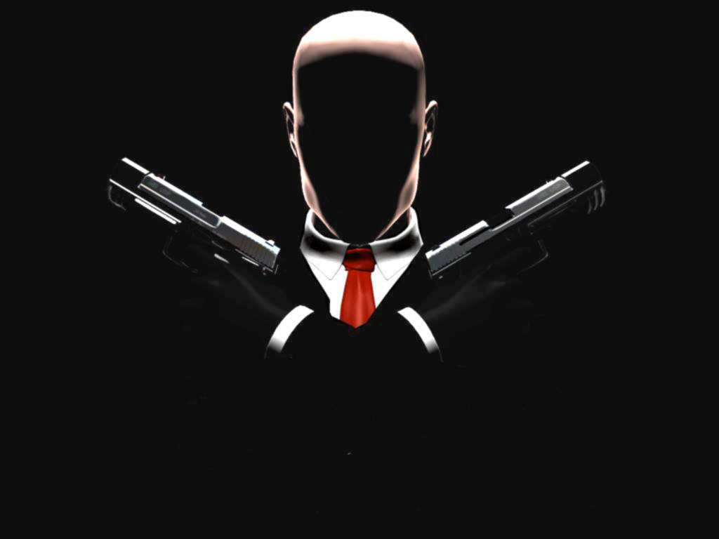 A Man In A Suit Holding Two Guns Wallpaper