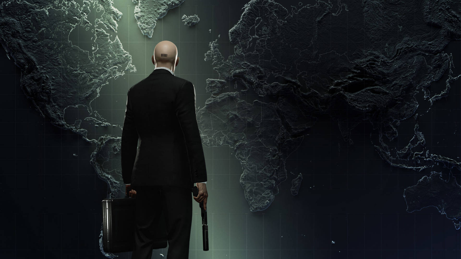 En mand iført jakkesæt står foran verdenskortet. Wallpaper