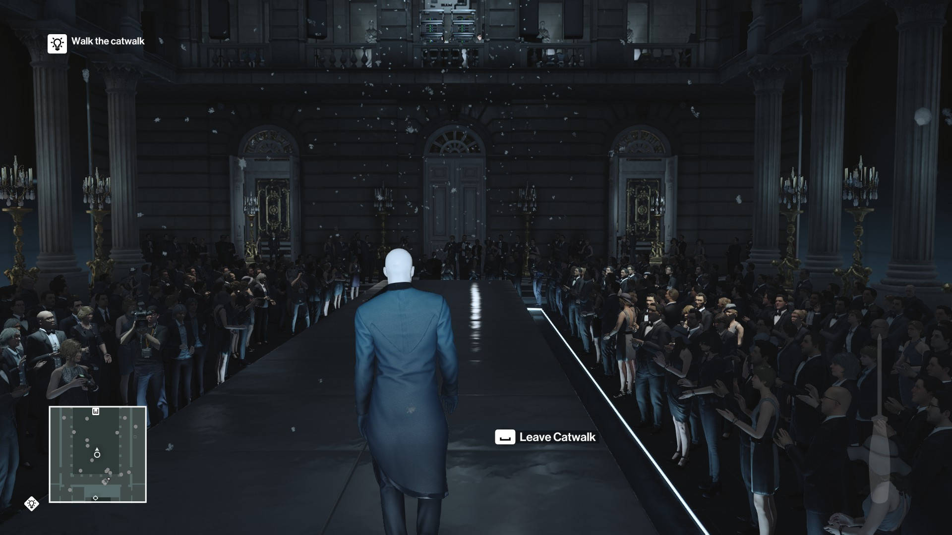 A Man In A Suit Walks Down The Runway Wallpaper