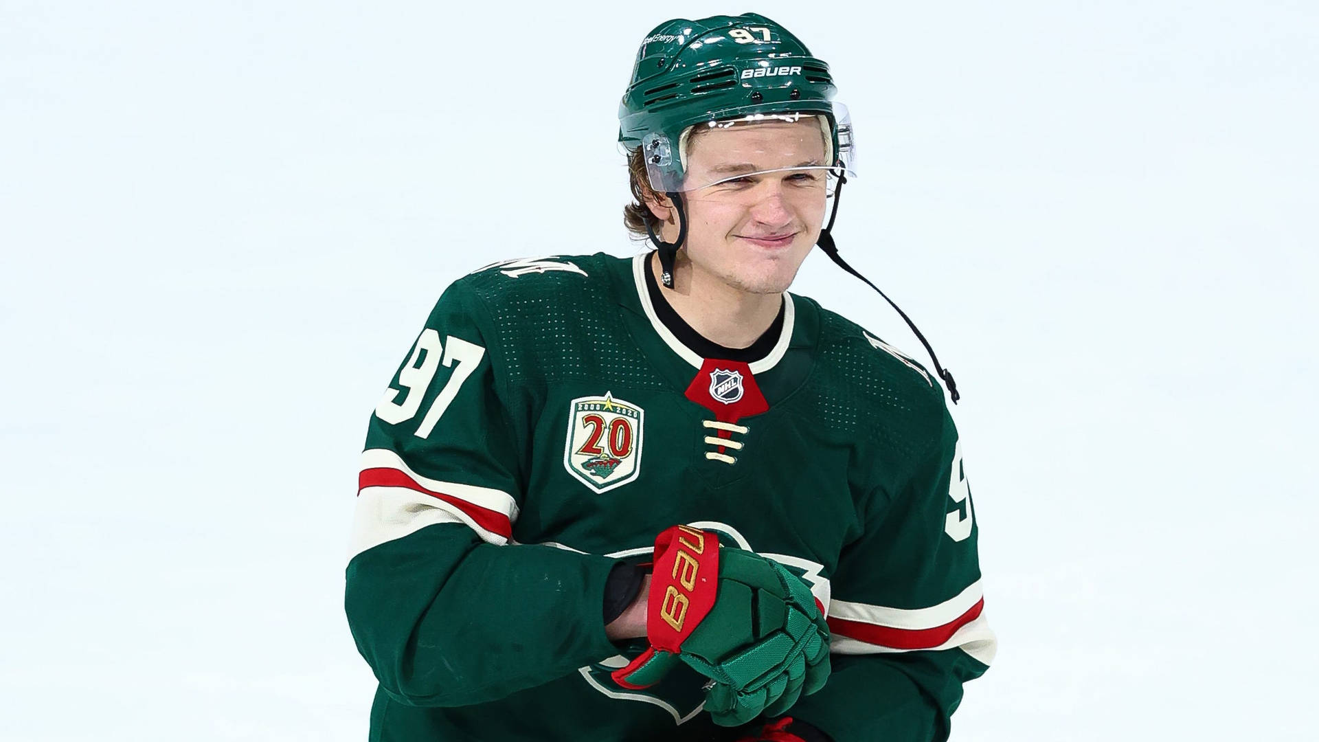 Hockey Player Kirill Kaprizov Smiling Wallpaper